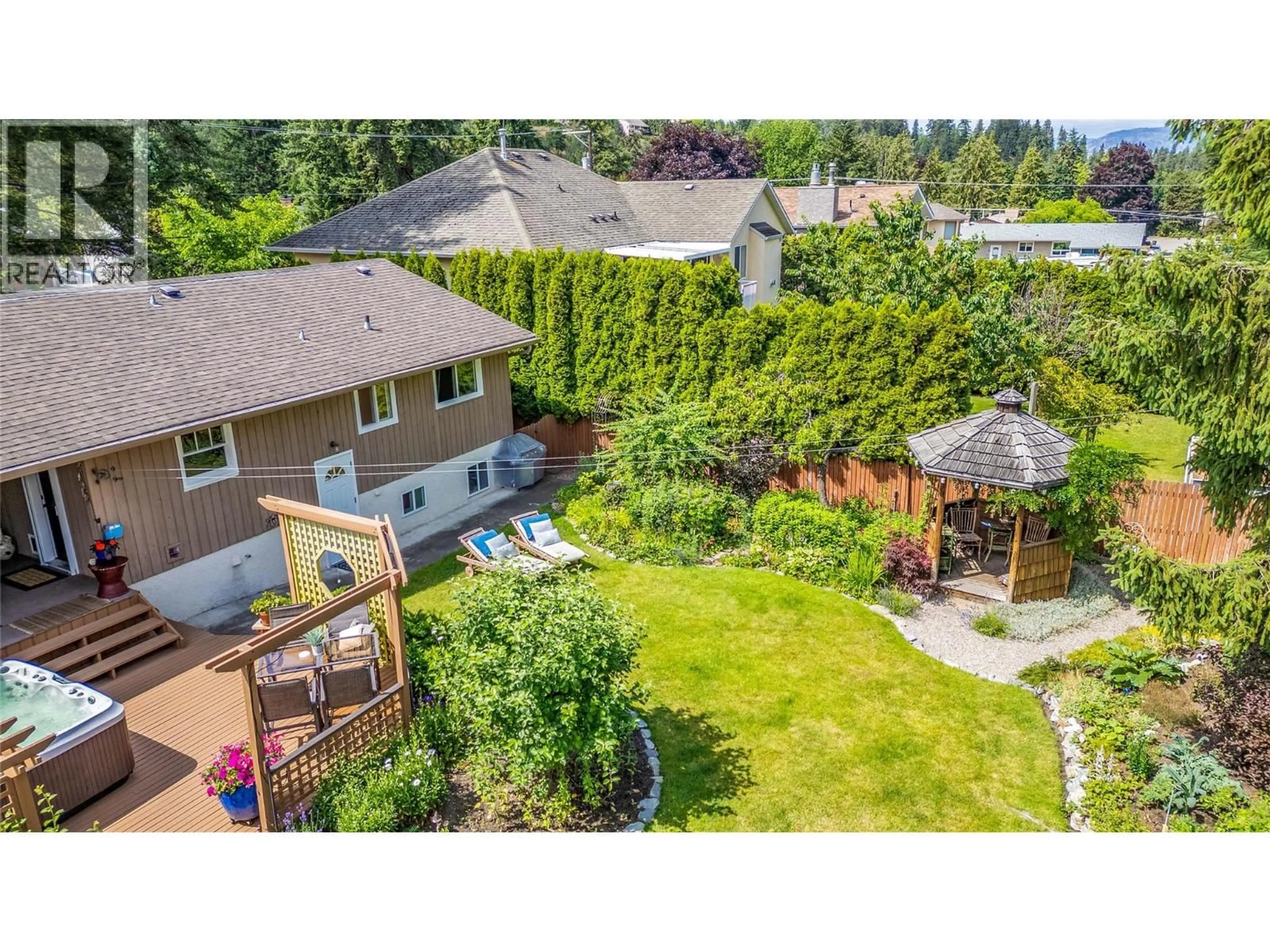 A pic from outside/outdoor area/front of a property/back of a property/a pic from drone, mountain view for 824 RAYMER ROAD, Kelowna British Columbia V1W1J8