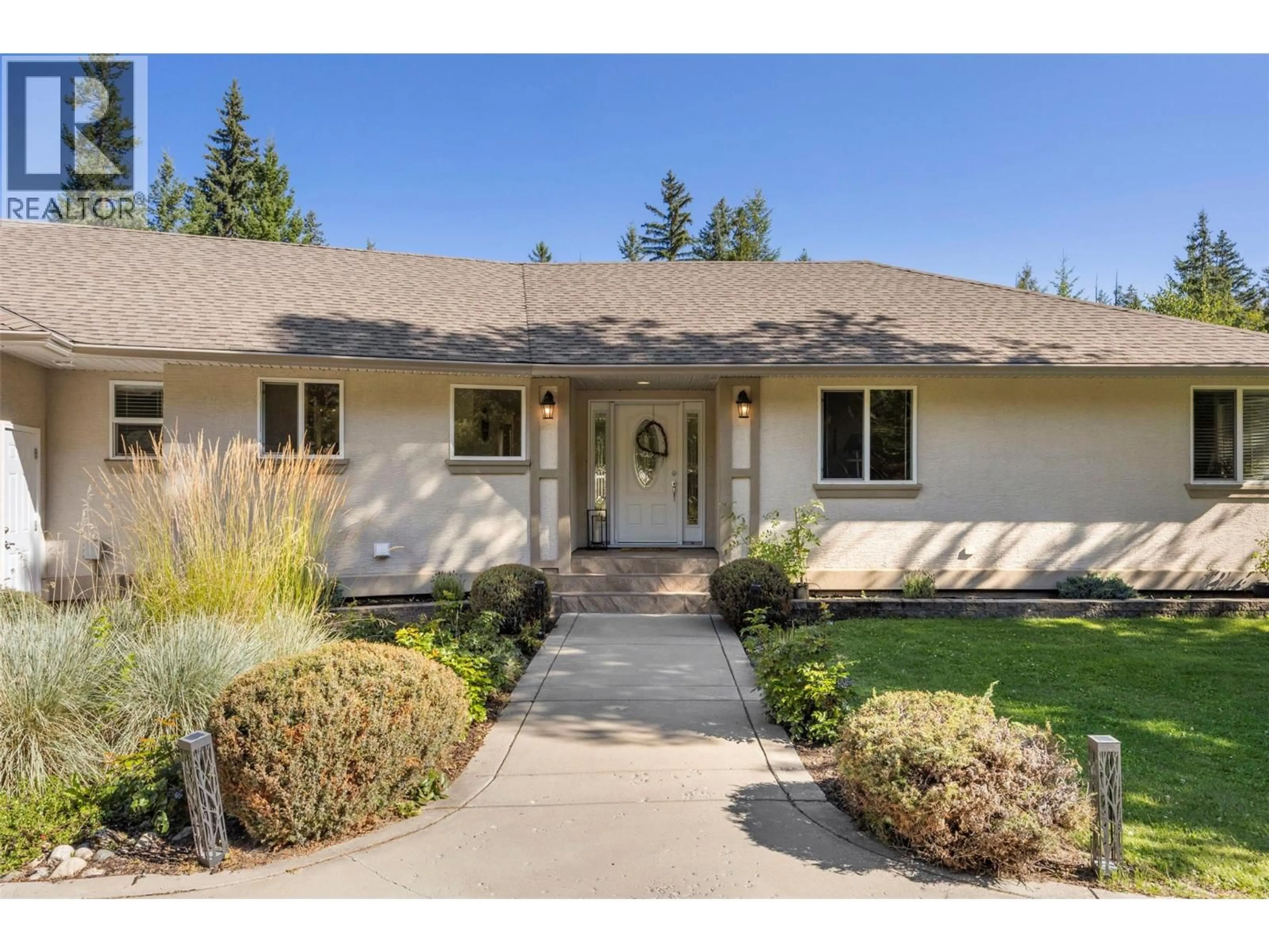 Home with vinyl exterior material, street for 4933 BIRCH LANE, Barriere British Columbia V0E1E0