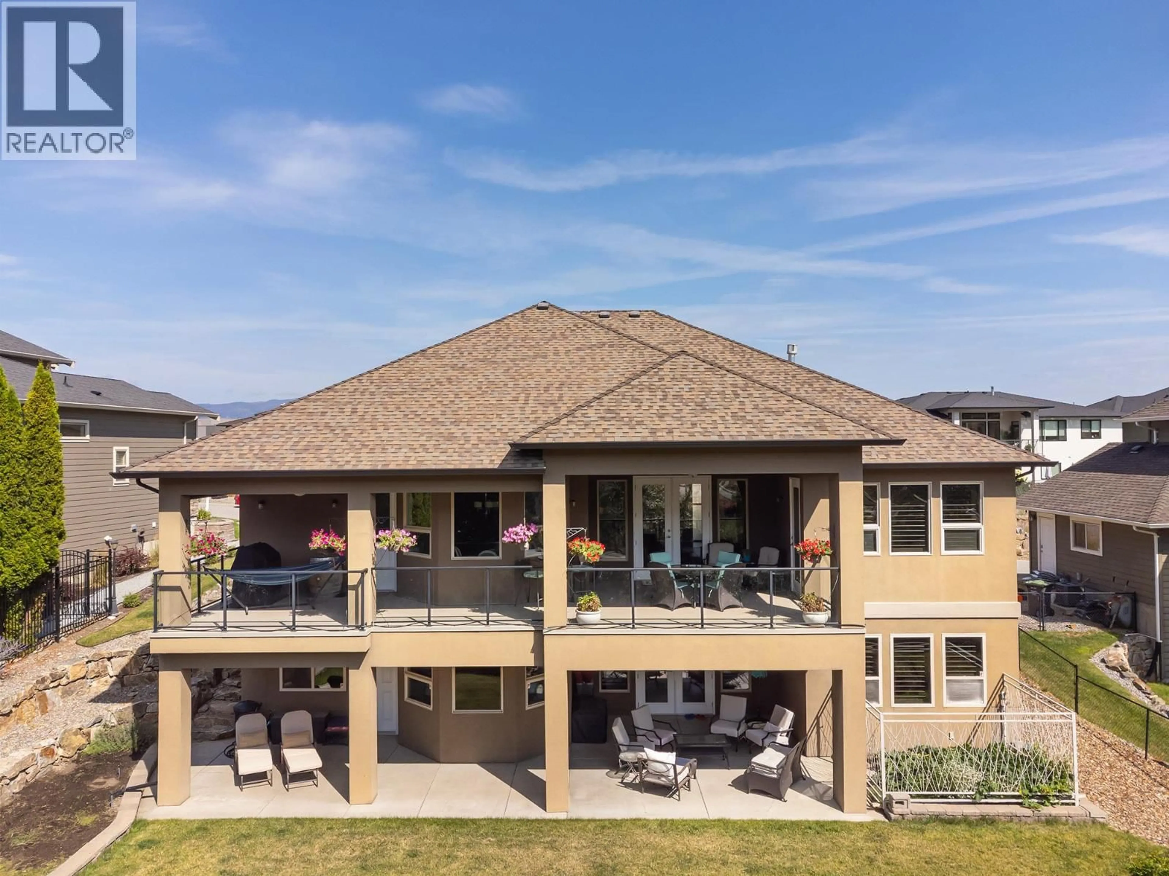A pic from outside/outdoor area/front of a property/back of a property/a pic from drone, unknown for 475 SWAN DRIVE, Kelowna British Columbia V1W5J5