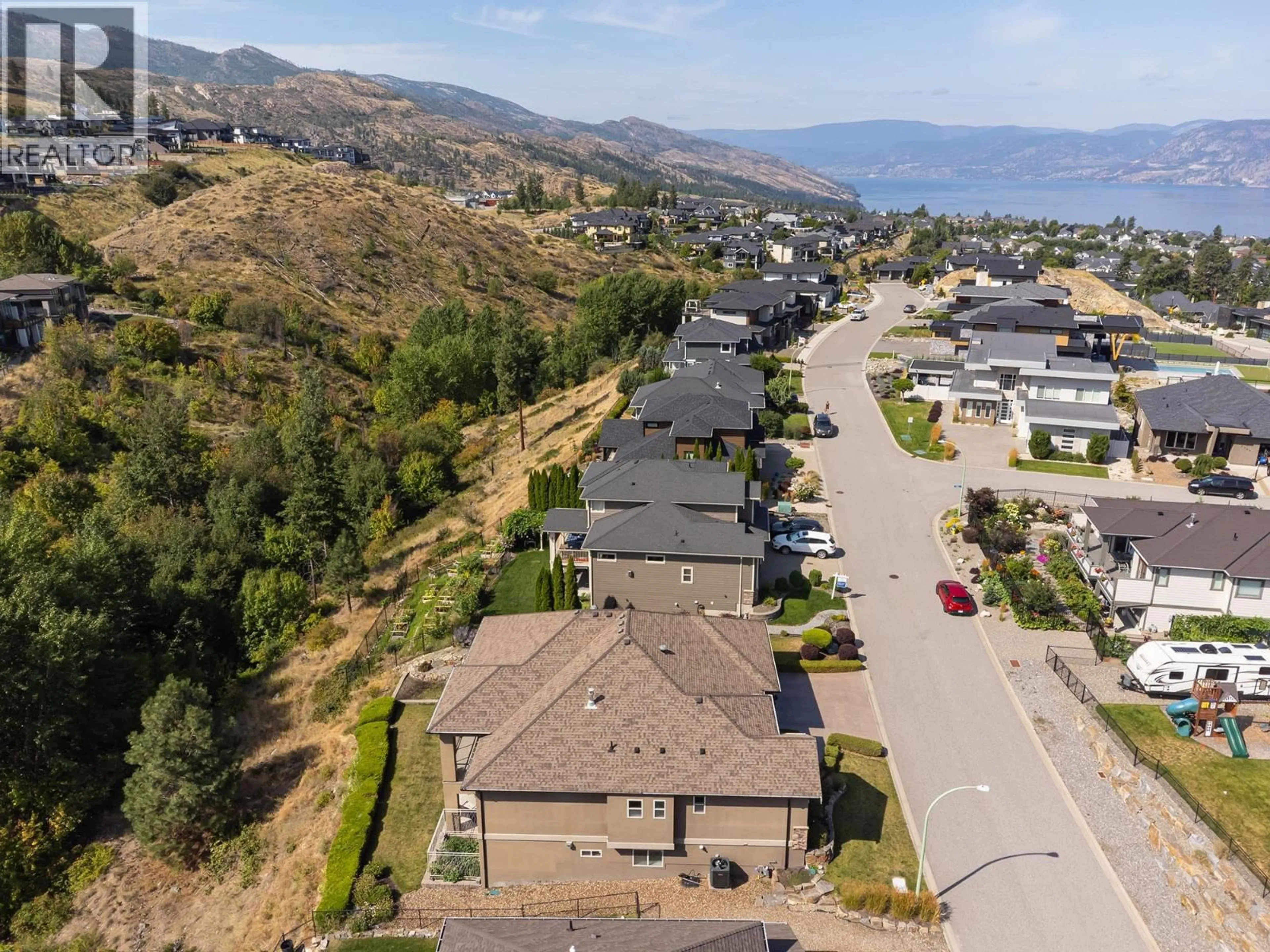 A pic from outside/outdoor area/front of a property/back of a property/a pic from drone, unknown for 475 SWAN DRIVE, Kelowna British Columbia V1W5J5