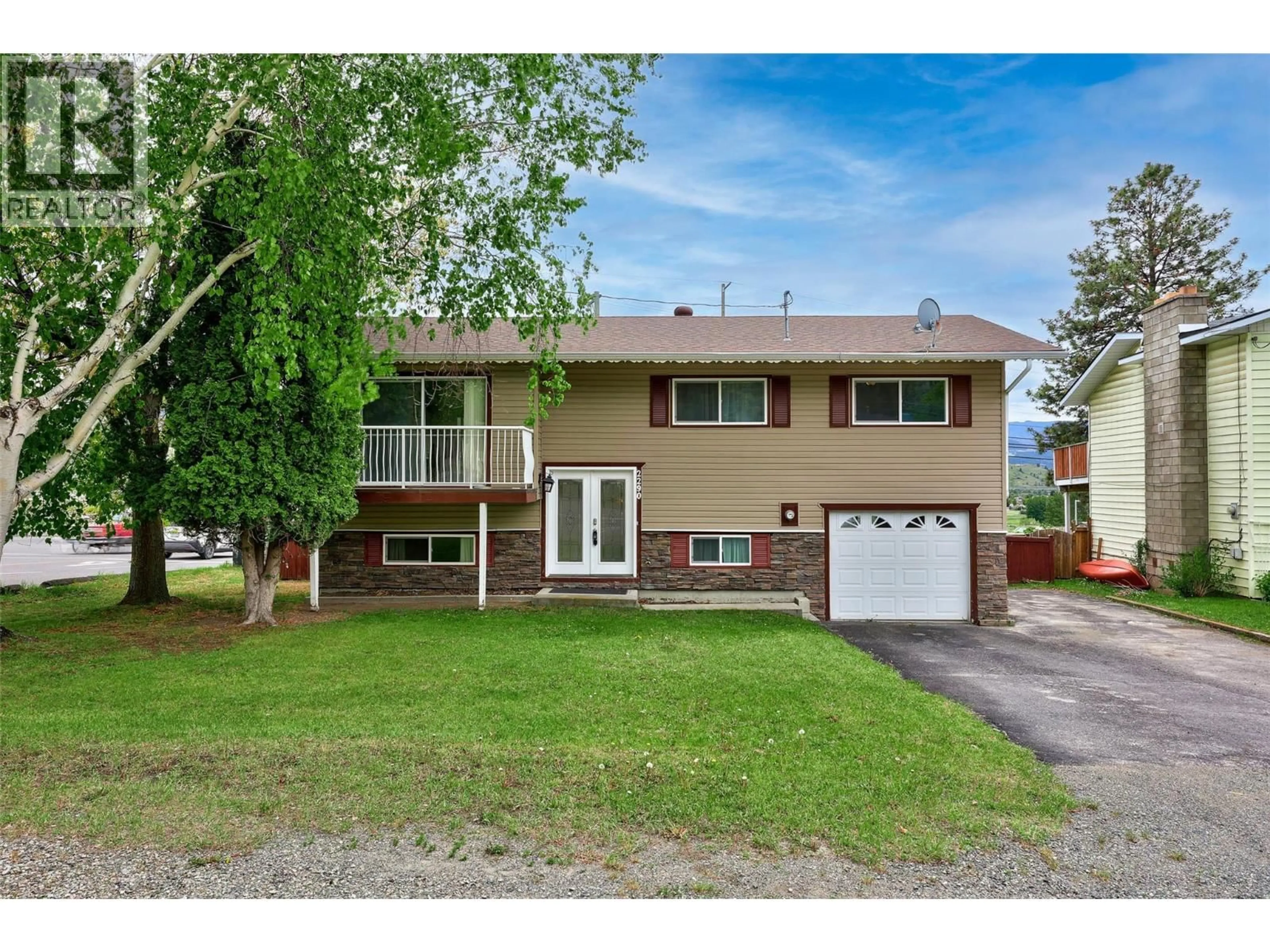 Home with vinyl exterior material, street for 2290 PARKER DRIVE, Merritt British Columbia V1K1J1