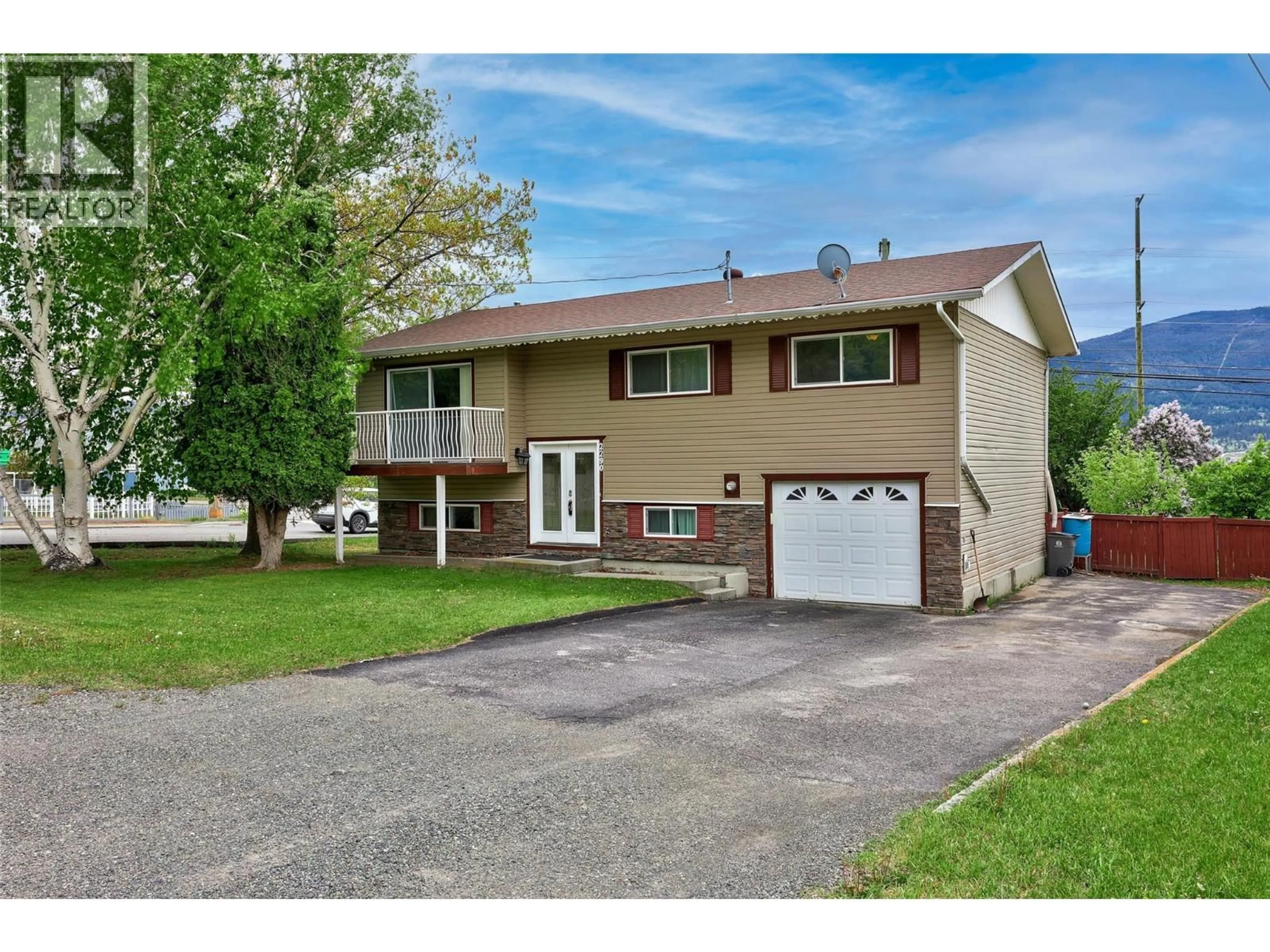 Home with vinyl exterior material, street for 2290 PARKER DRIVE, Merritt British Columbia V1K1J1
