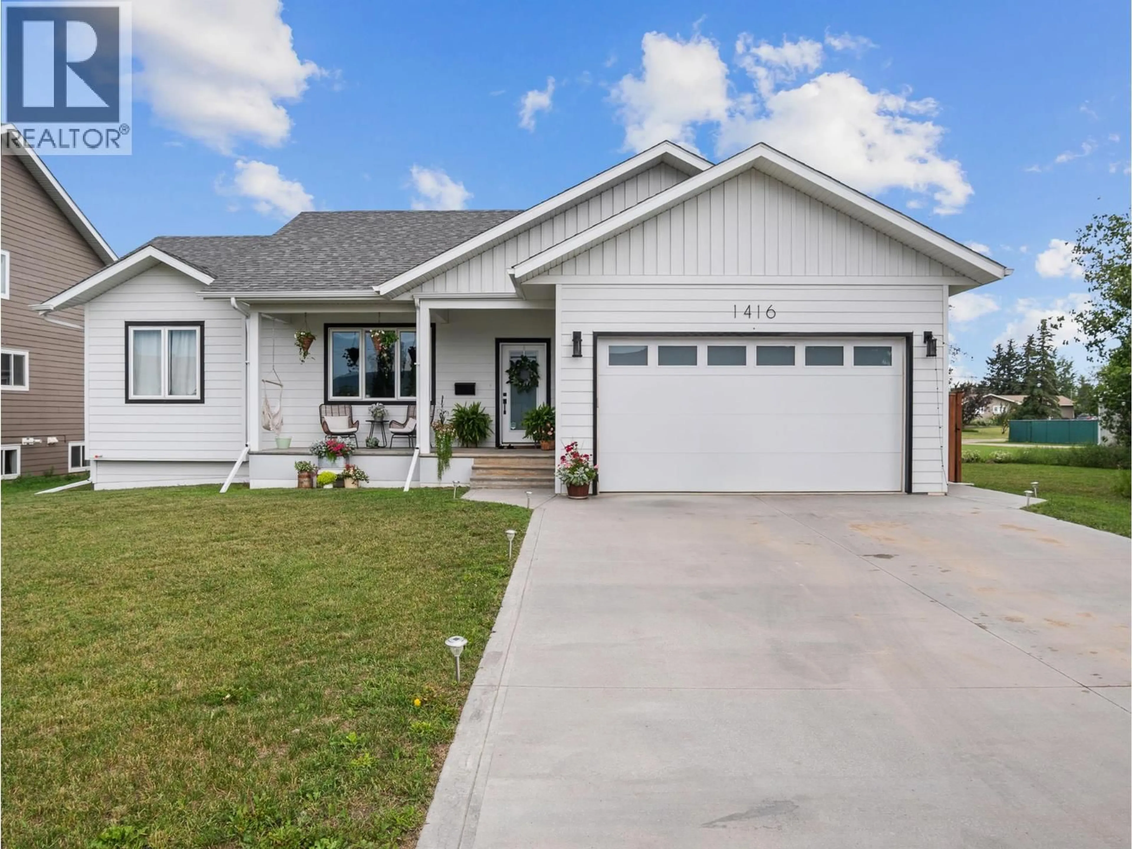Home with vinyl exterior material, street for 1416 108 AVENUE, Dawson Creek British Columbia V1G2T3