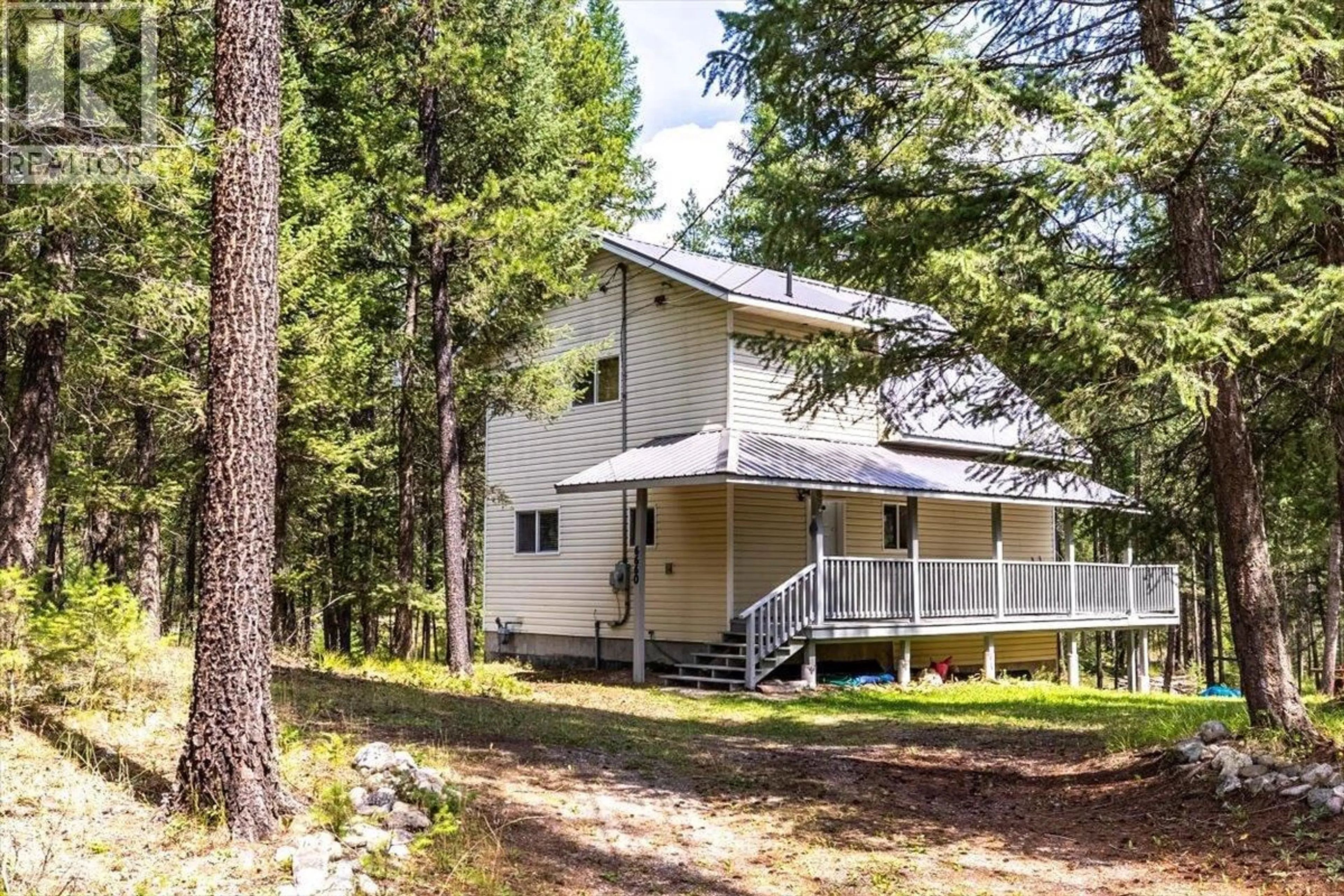 Home with vinyl exterior material, forest/trees view for 6660 MCLEAN ROAD, Jaffray British Columbia V0B1T0
