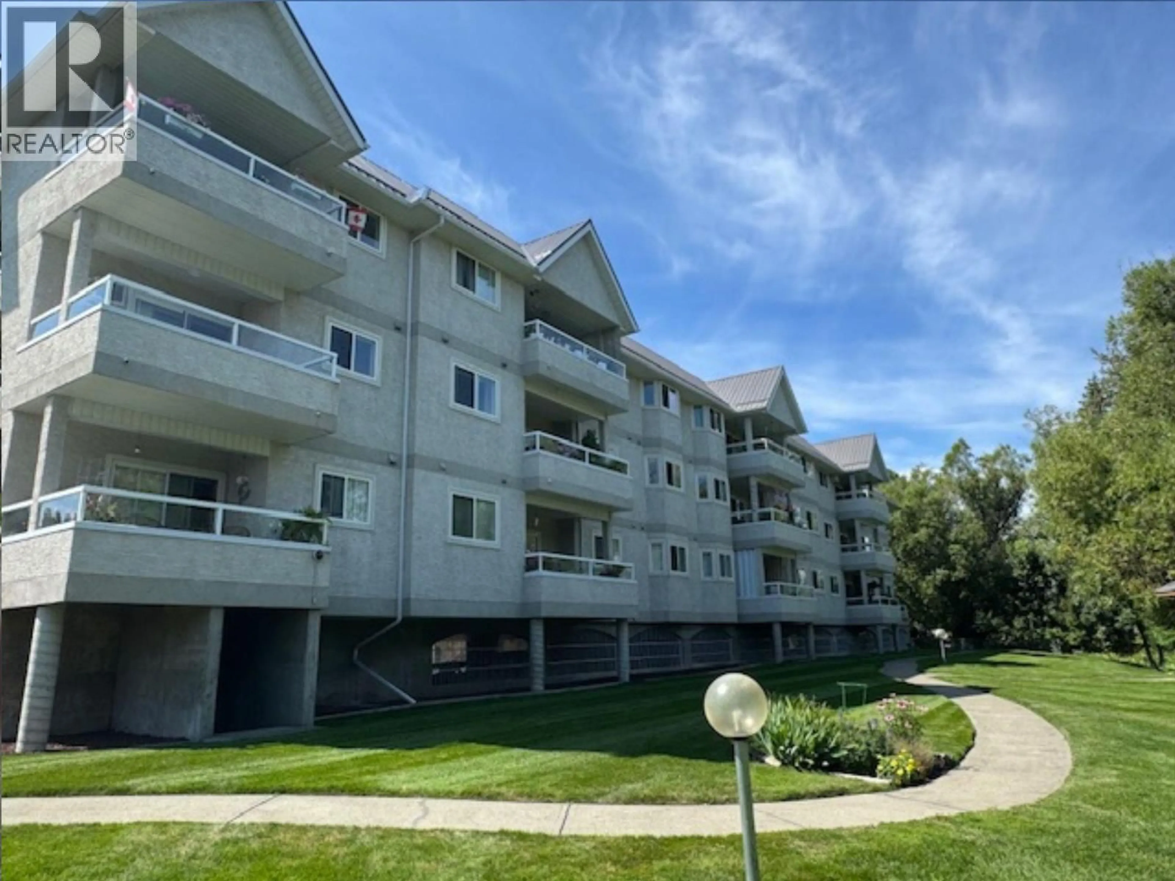 A pic from outside/outdoor area/front of a property/back of a property/a pic from drone, unknown for 304 - 1700 2ND STREET NORTH, Cranbrook British Columbia V1C6M8