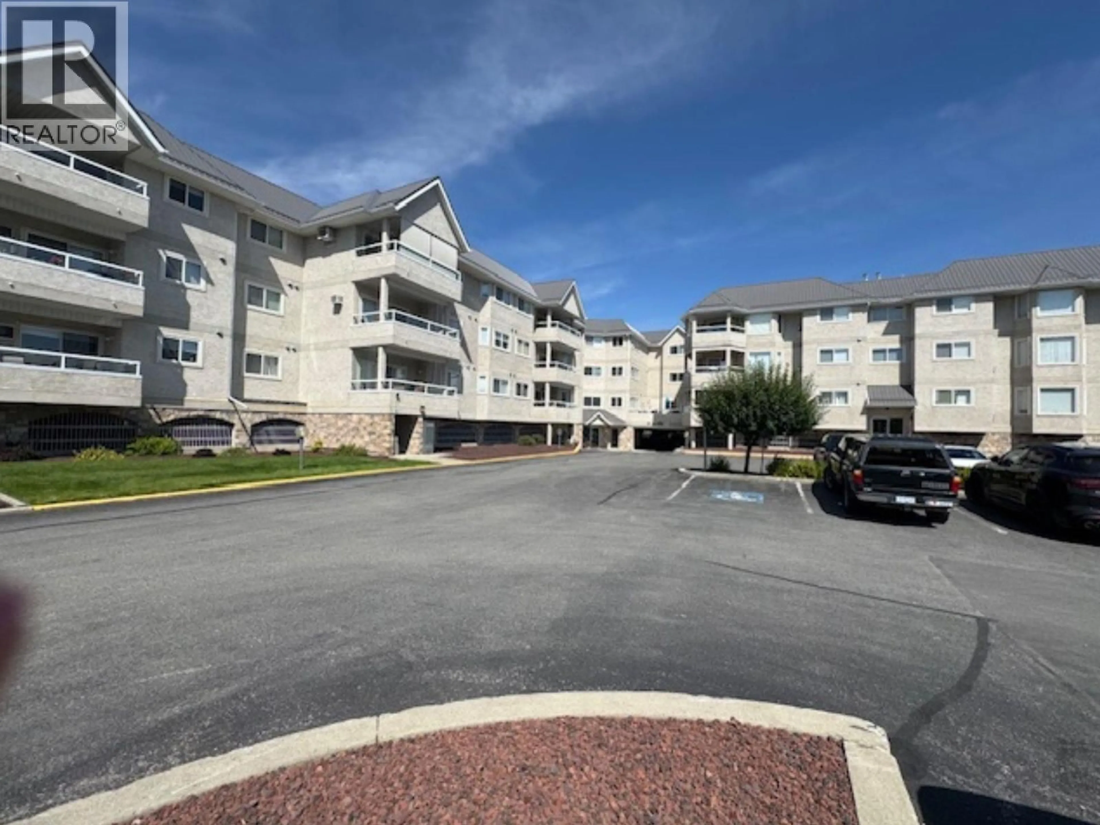 A pic from outside/outdoor area/front of a property/back of a property/a pic from drone, mountain view for 304 - 1700 2ND STREET NORTH, Cranbrook British Columbia V1C6M8