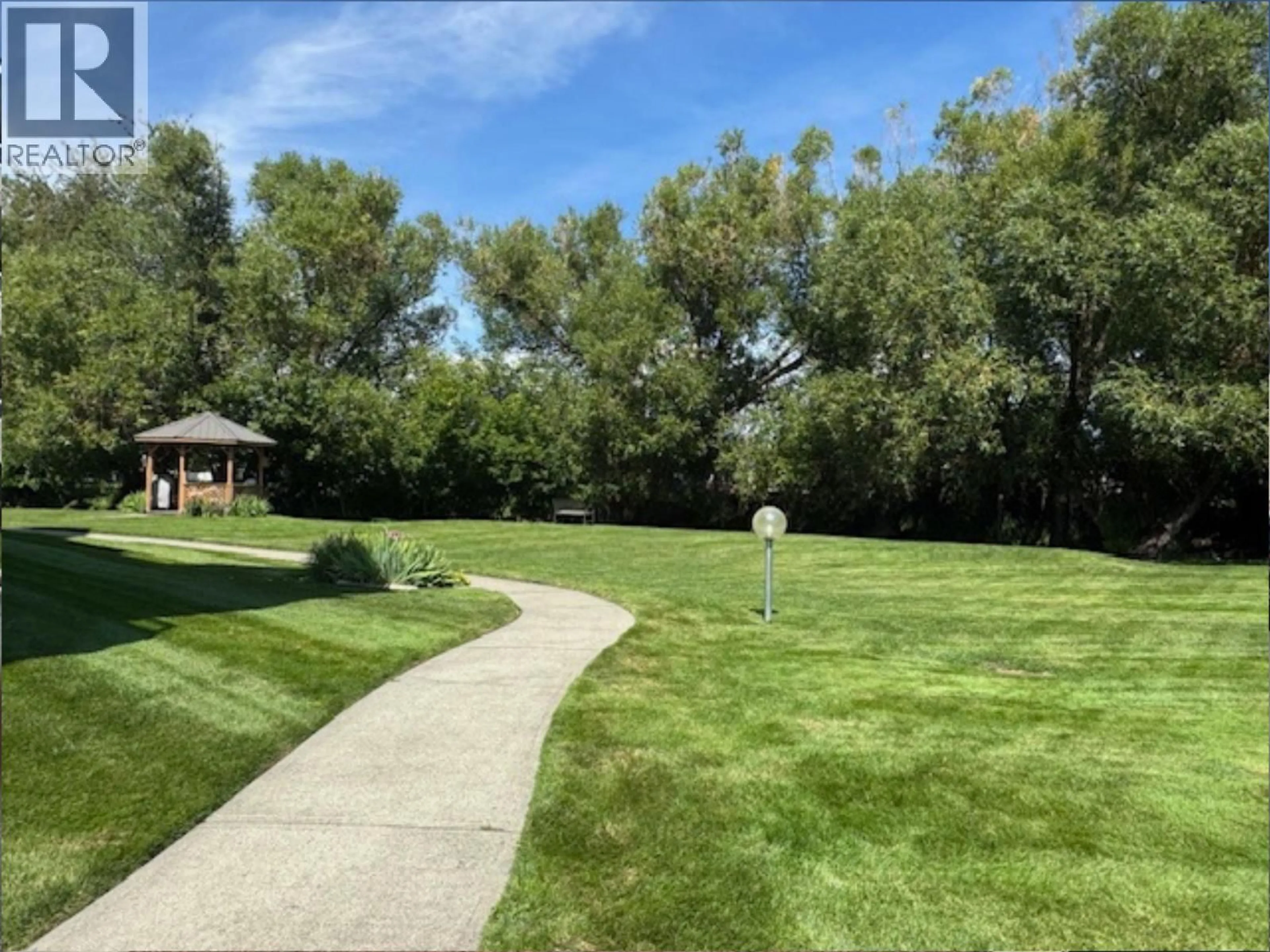 A pic from outside/outdoor area/front of a property/back of a property/a pic from drone, unknown for 304 - 1700 2ND STREET NORTH, Cranbrook British Columbia V1C6M8