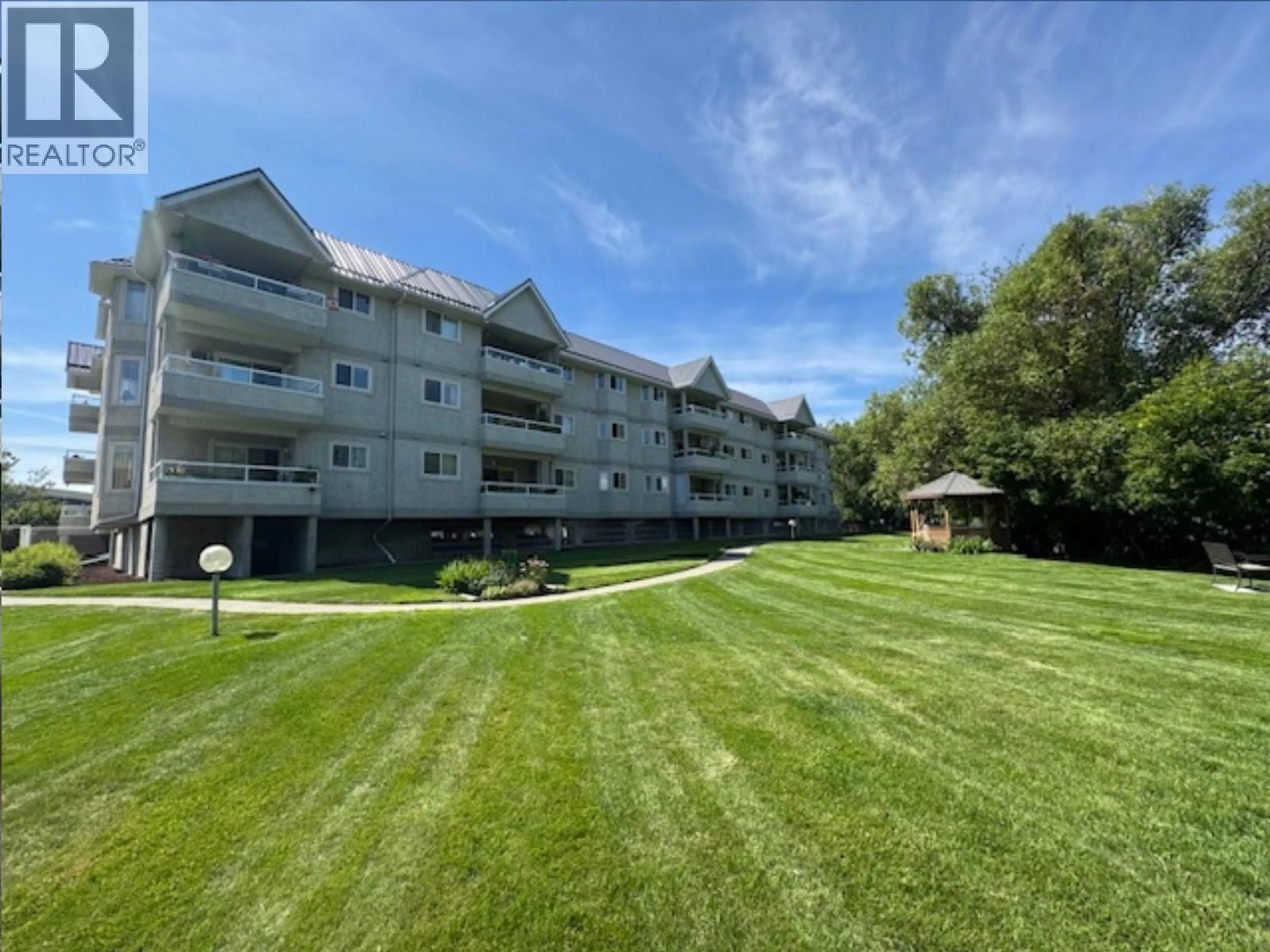 A pic from outside/outdoor area/front of a property/back of a property/a pic from drone, water/lake/river/ocean view for 304 - 1700 2ND STREET NORTH, Cranbrook British Columbia V1C6M8