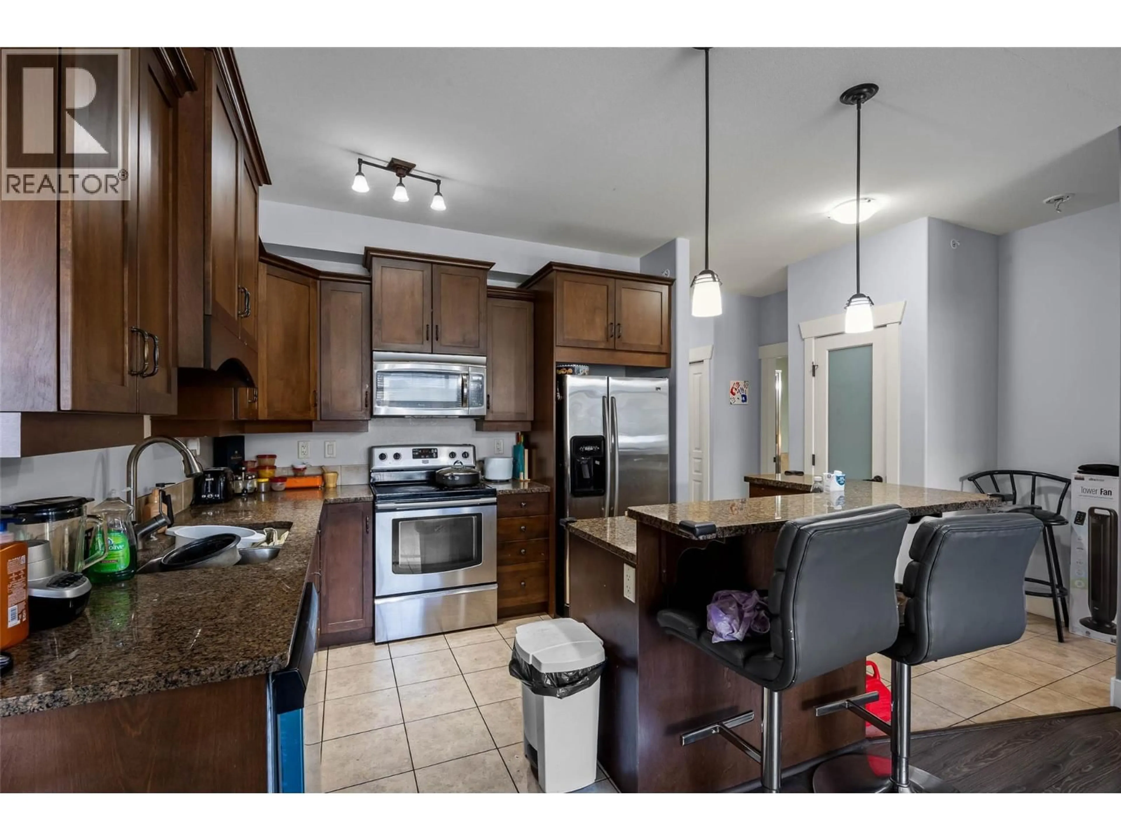Open concept kitchen, ceramic/tile floor for 412 - 795 MCGILL ROAD, Kamloops British Columbia V2C0B9