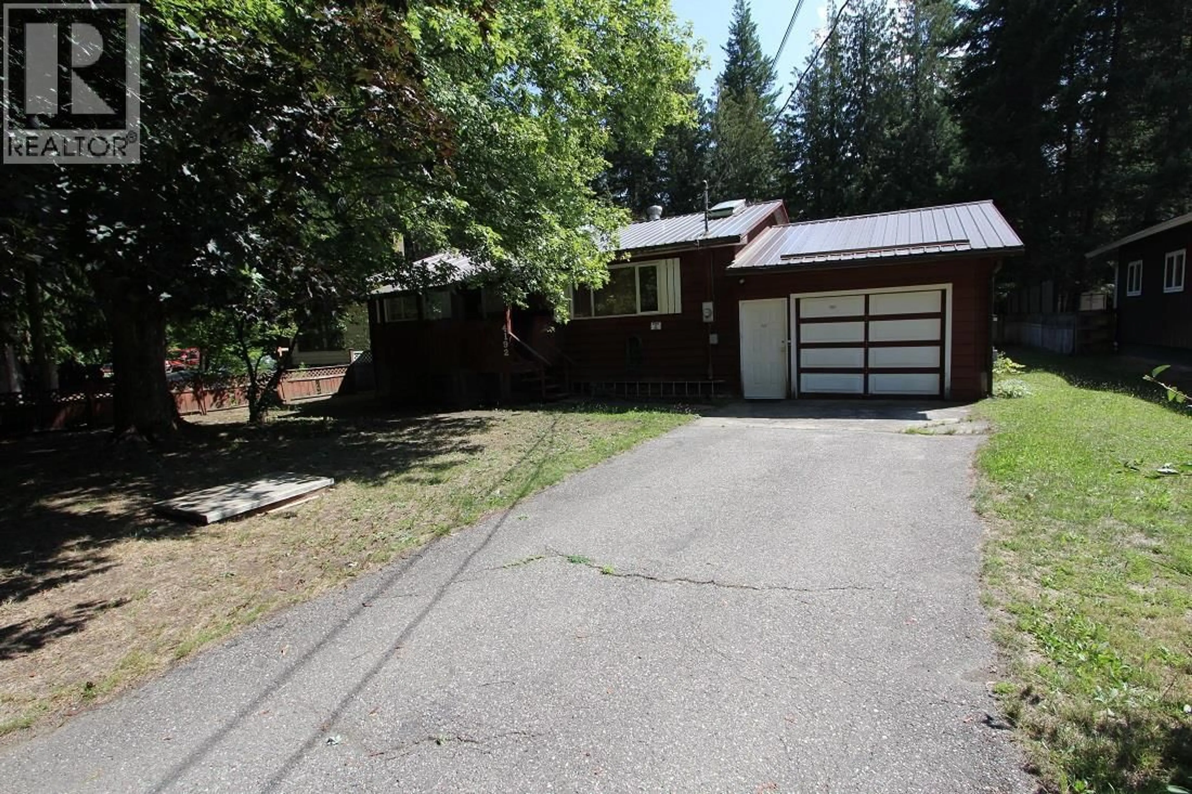 A pic from outside/outdoor area/front of a property/back of a property/a pic from drone, street for 4192 SARATOGA ROAD, Scotch Creek British Columbia V0E1M5