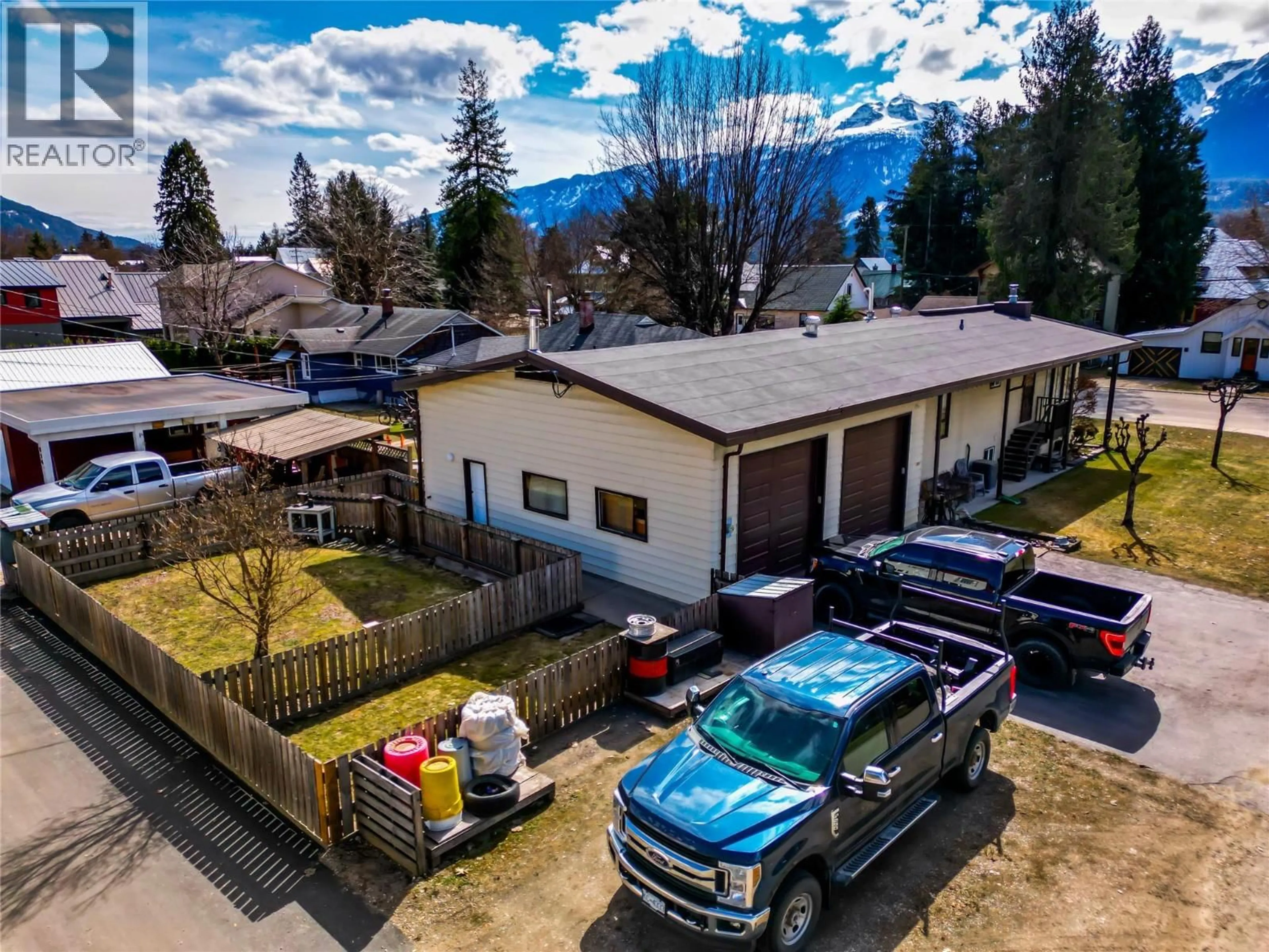 A pic from outside/outdoor area/front of a property/back of a property/a pic from drone, mountain view for 108 FORD STREET, Revelstoke British Columbia V0E2S0