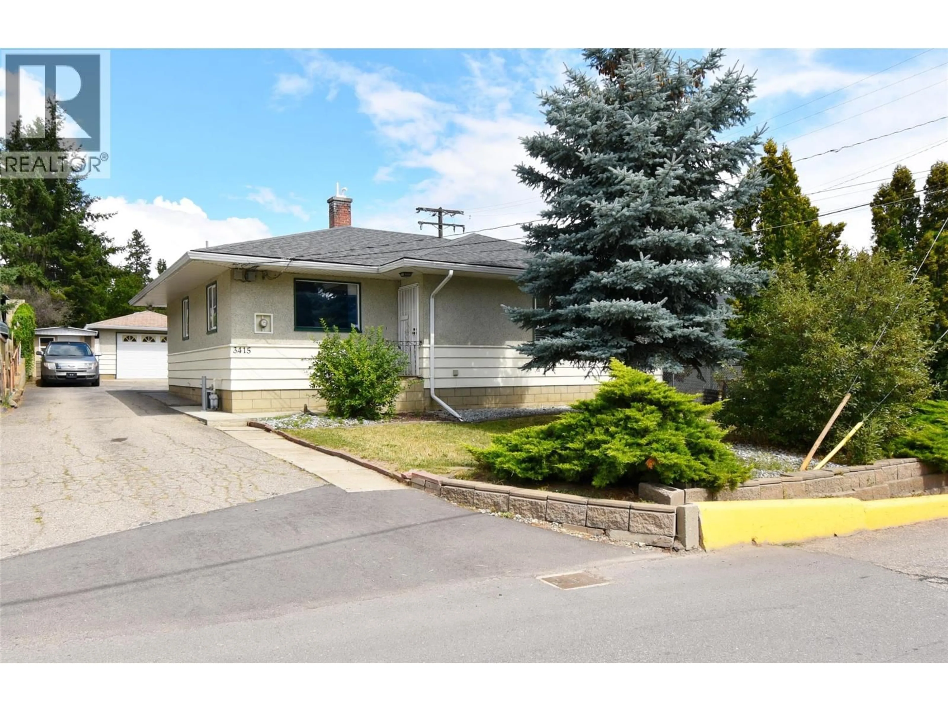 Home with vinyl exterior material, street for 3415 35 AVENUE, Vernon British Columbia V1T2T5