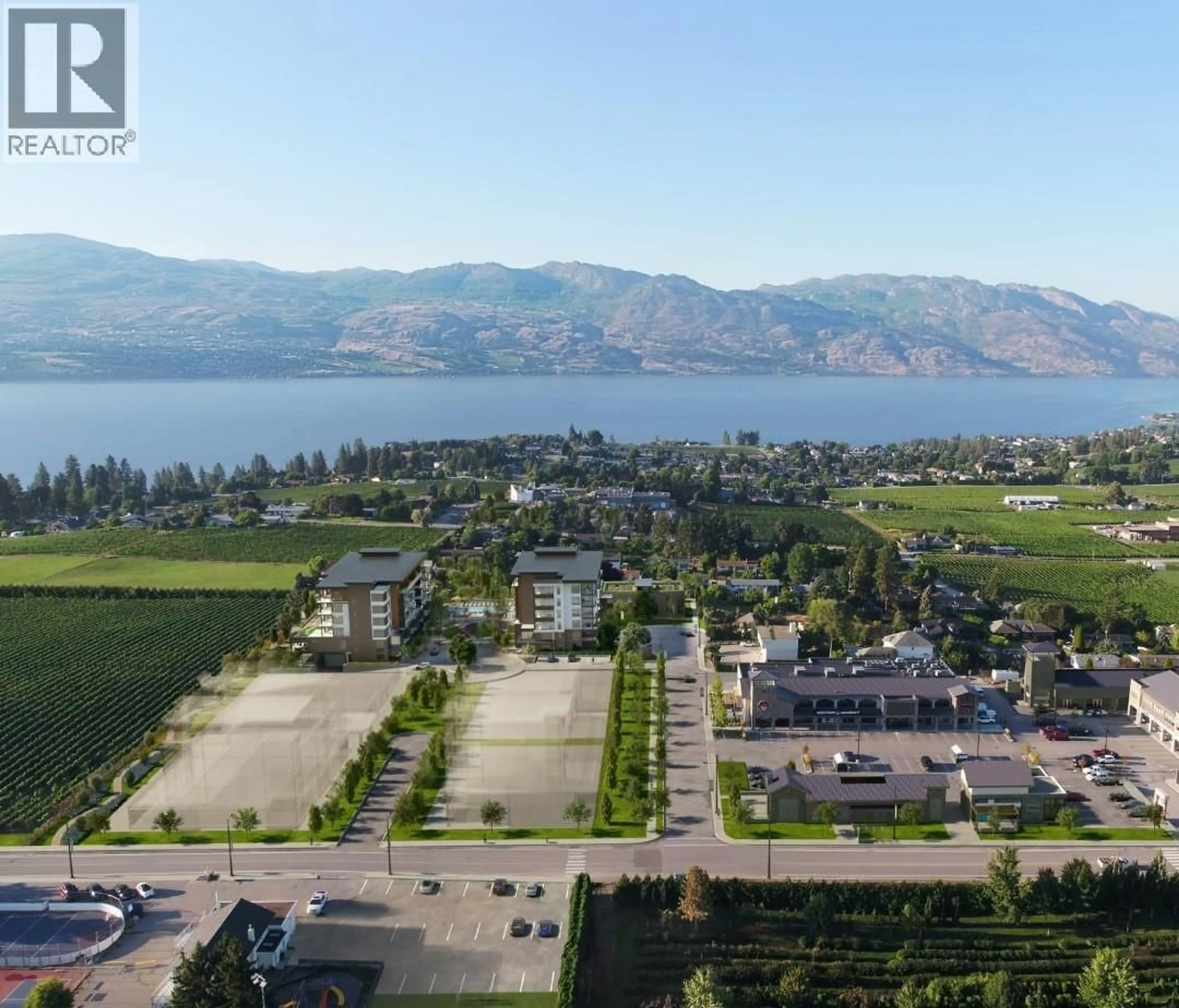 A pic from outside/outdoor area/front of a property/back of a property/a pic from drone, water/lake/river/ocean view for 301 - 2760 OLALLA ROAD, West Kelowna British Columbia V1Z2A9