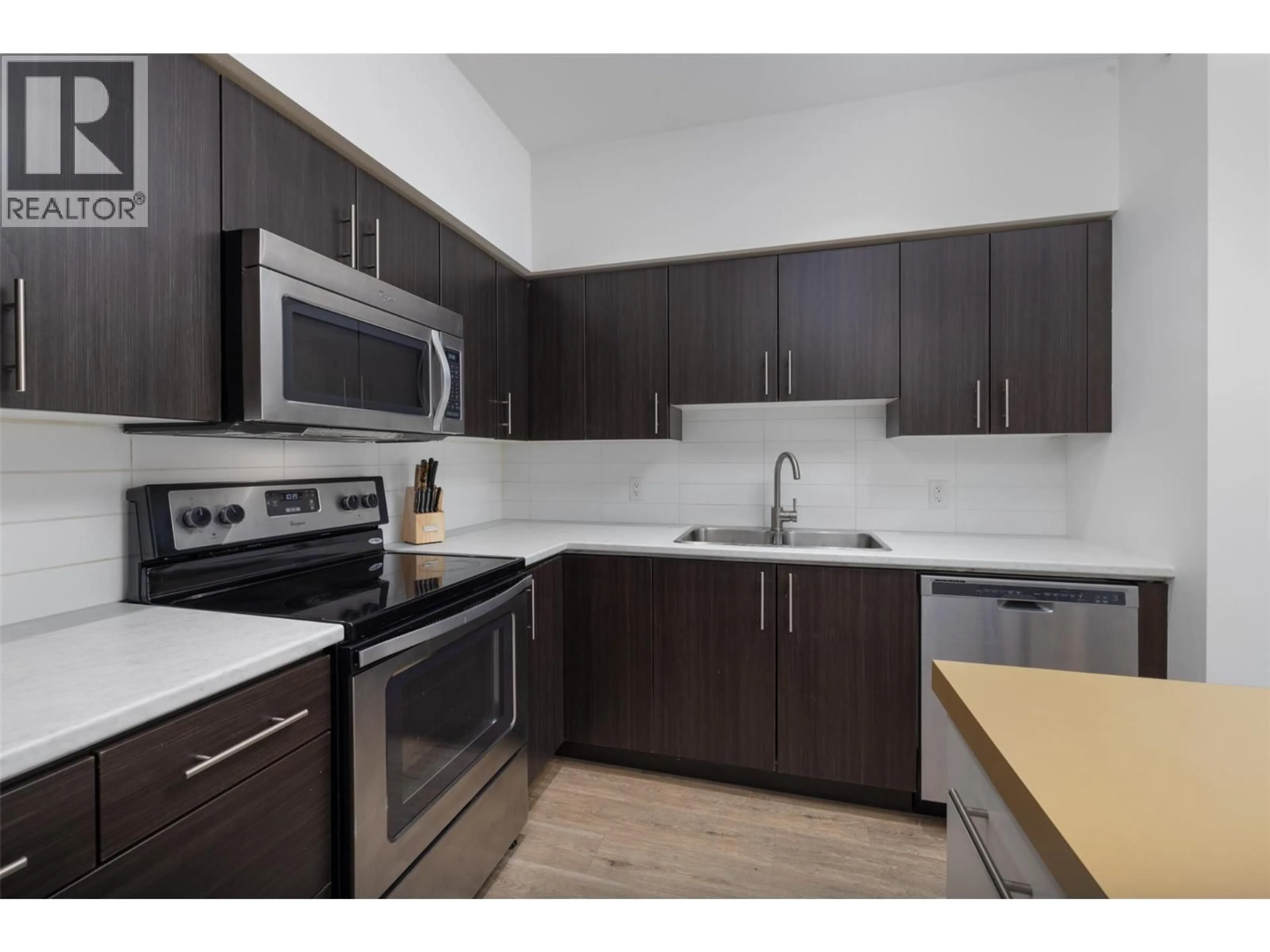 Standard kitchen, unknown for 401 - 975 ACADEMY WAY, Kelowna British Columbia V1V3C8
