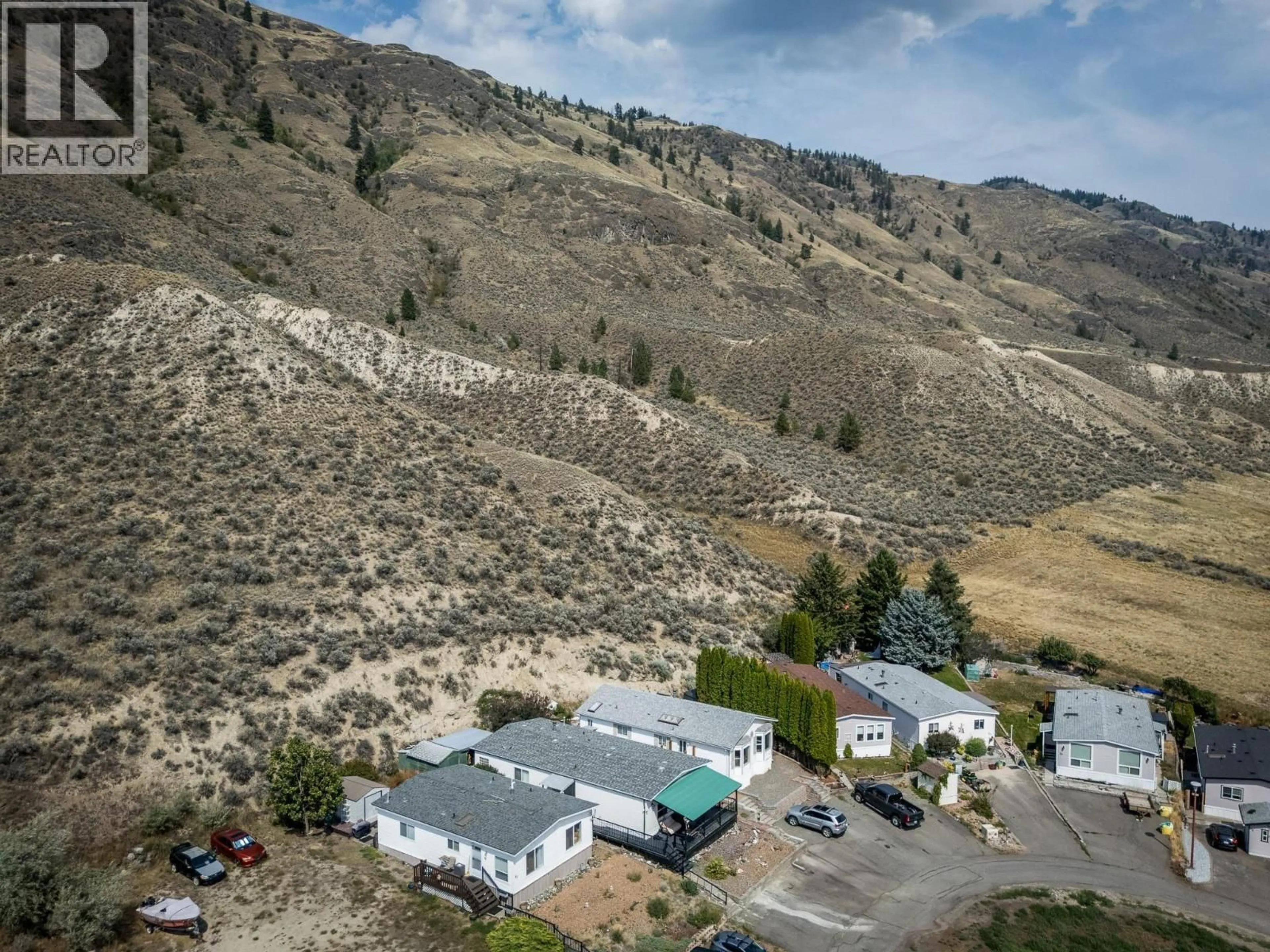 A pic from outside/outdoor area/front of a property/back of a property/a pic from drone, mountain view for 40 - 3099 SHUSWAP ROAD, Kamloops British Columbia V2H1T7