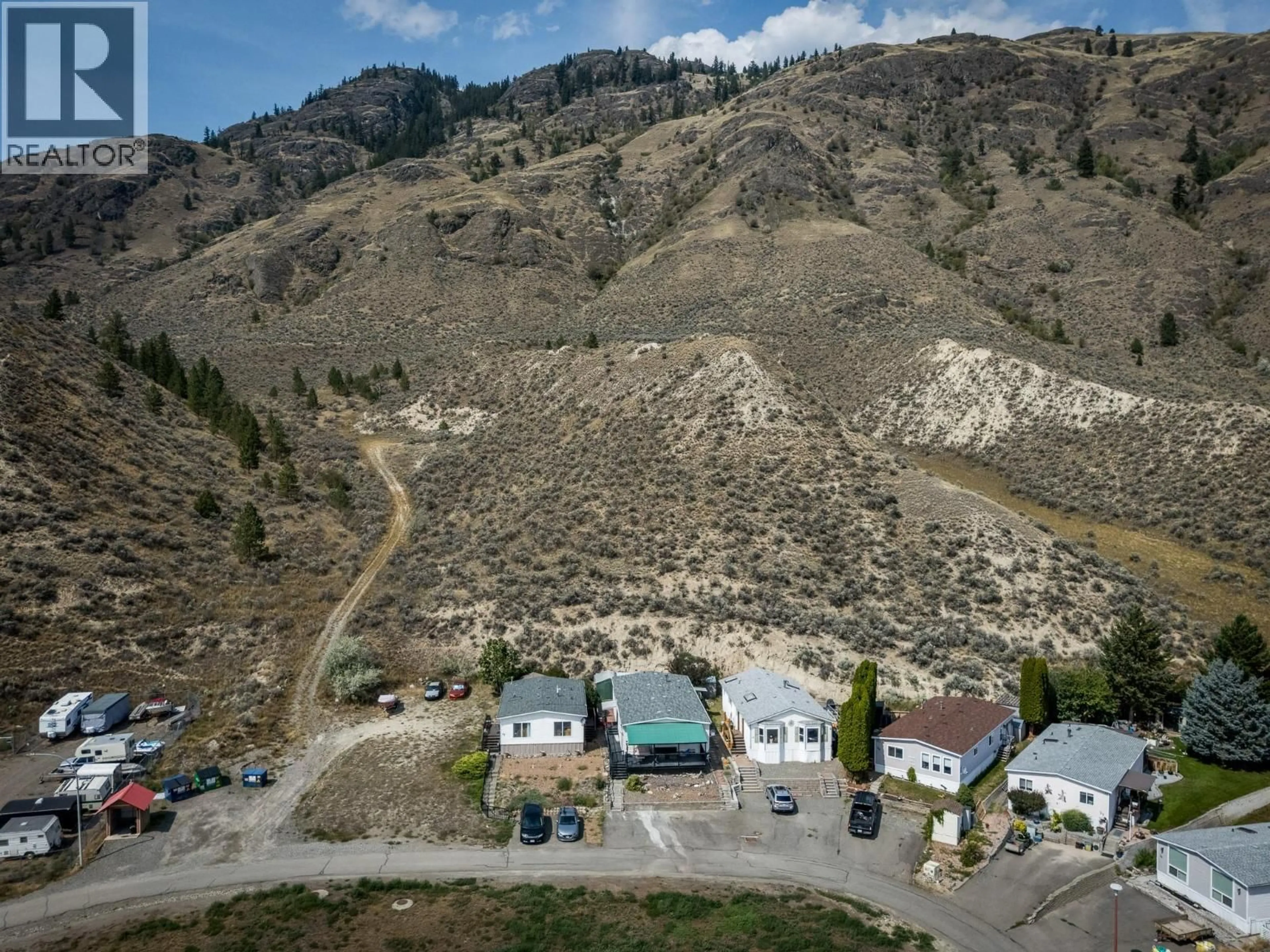 A pic from outside/outdoor area/front of a property/back of a property/a pic from drone, mountain view for 40 - 3099 SHUSWAP ROAD, Kamloops British Columbia V2H1T7