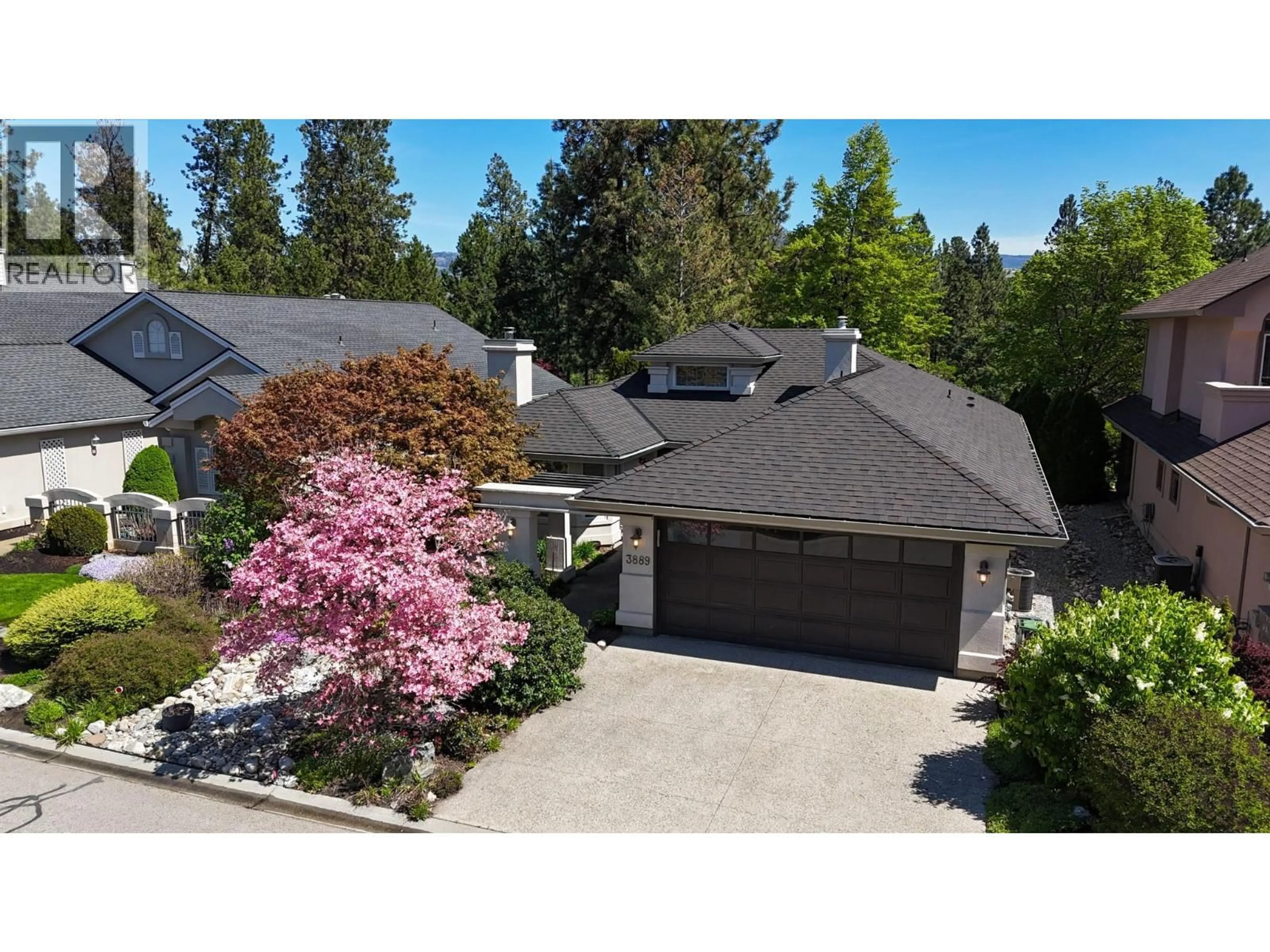 A pic from outside/outdoor area/front of a property/back of a property/a pic from drone, street for 3889 GALLAGHERS OTHER, Kelowna British Columbia V1W3Z9