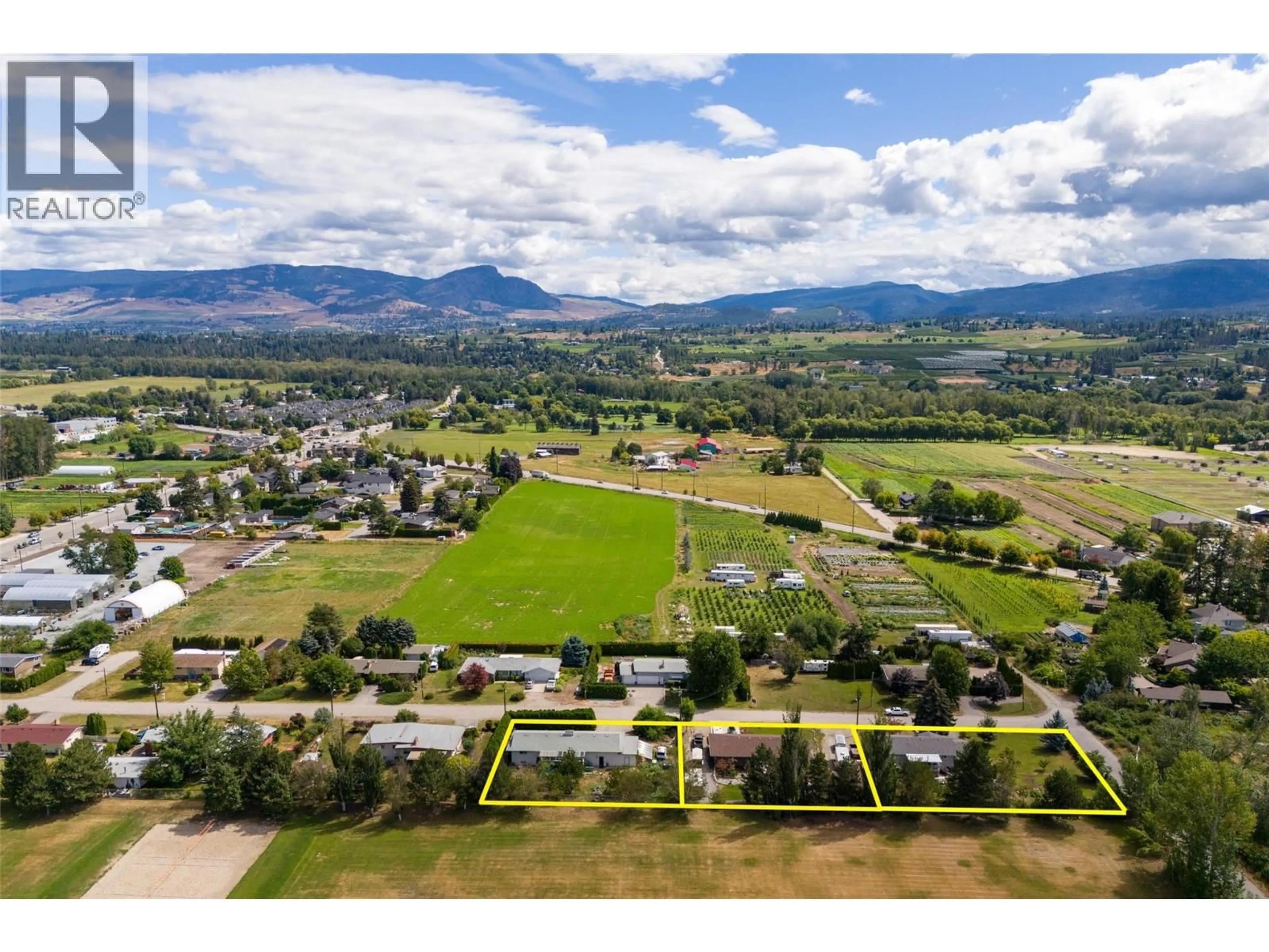 A pic from outside/outdoor area/front of a property/back of a property/a pic from drone, mountain view for 3260 ST AMAND ROAD, Kelowna British Columbia V1W3P1