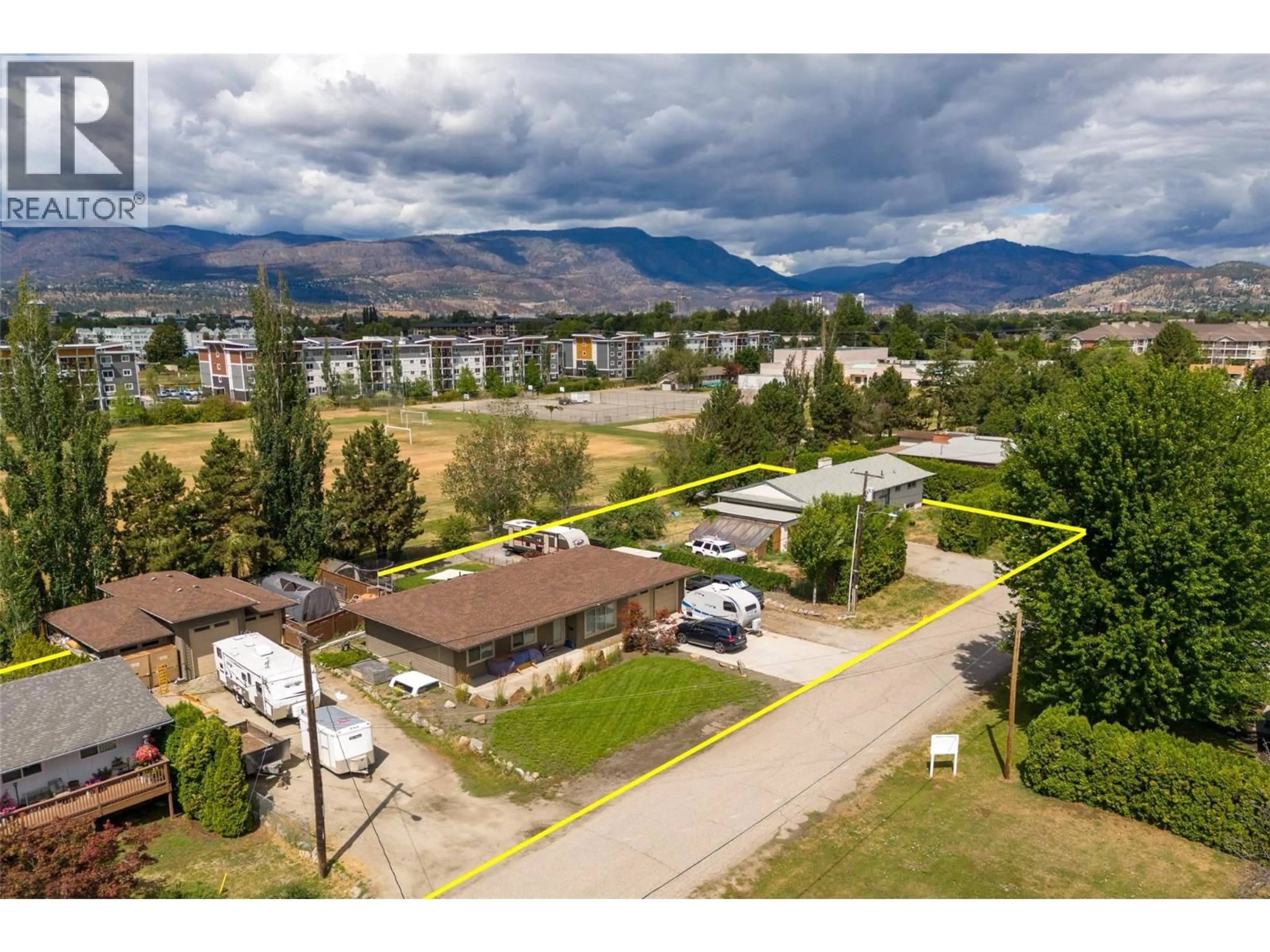 A pic from outside/outdoor area/front of a property/back of a property/a pic from drone, mountain view for 3260 ST AMAND ROAD, Kelowna British Columbia V1W3P1
