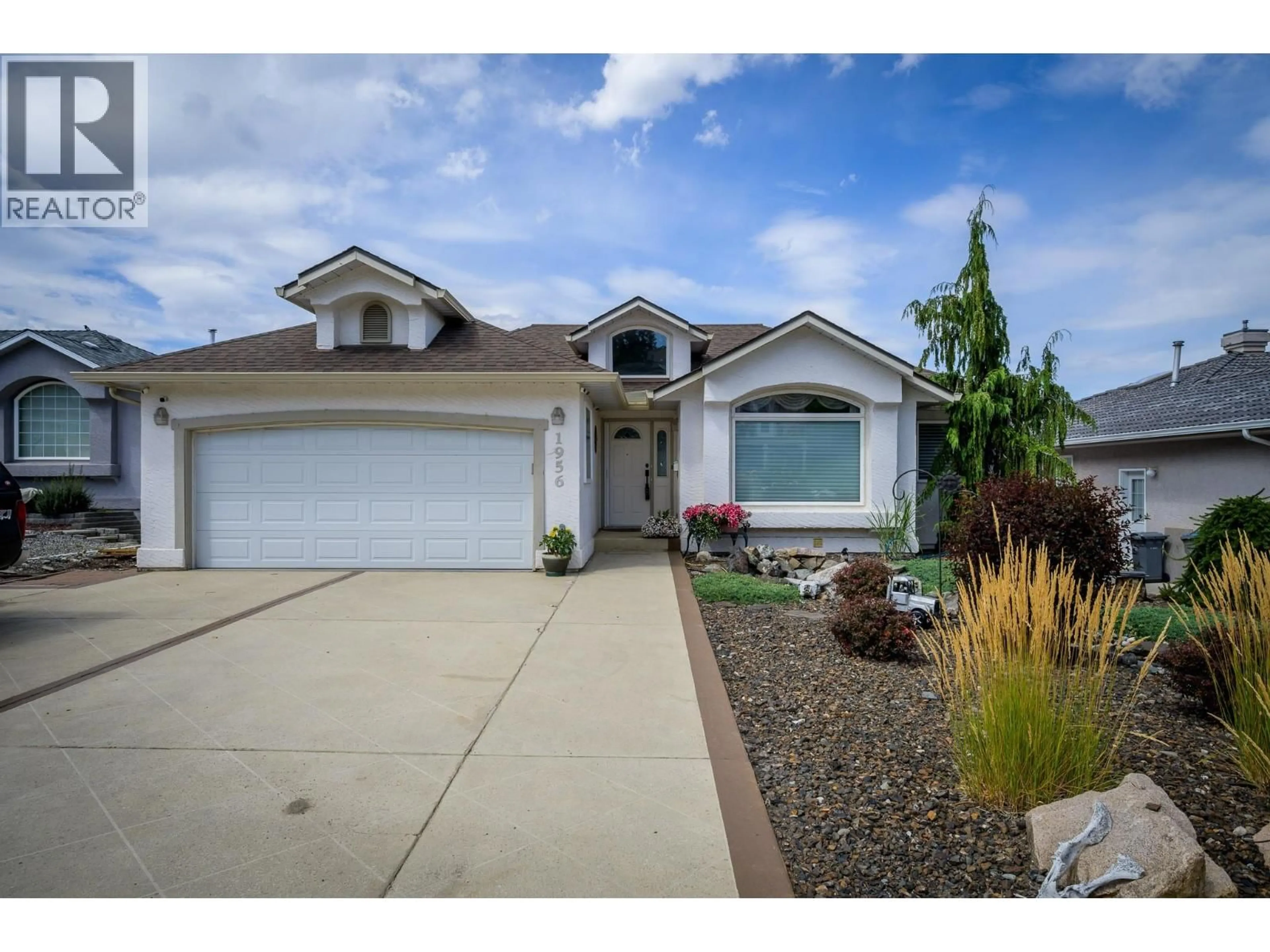 Home with vinyl exterior material, street for 1956 GLOAMING DRIVE, Kamloops British Columbia V1S1P8