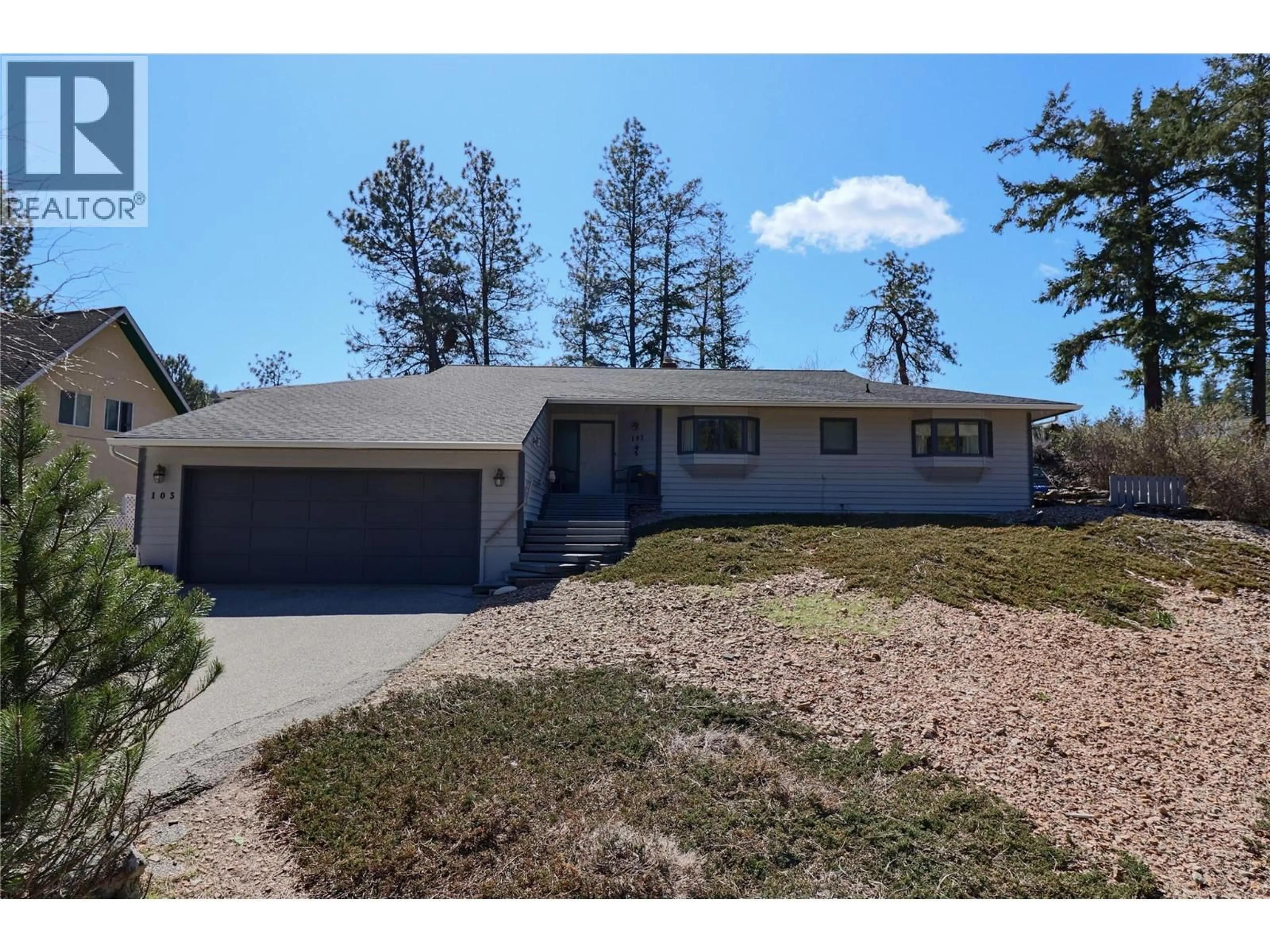 Home with vinyl exterior material, street for 103 EAGLE DRIVE, Kaleden British Columbia V0H1K0