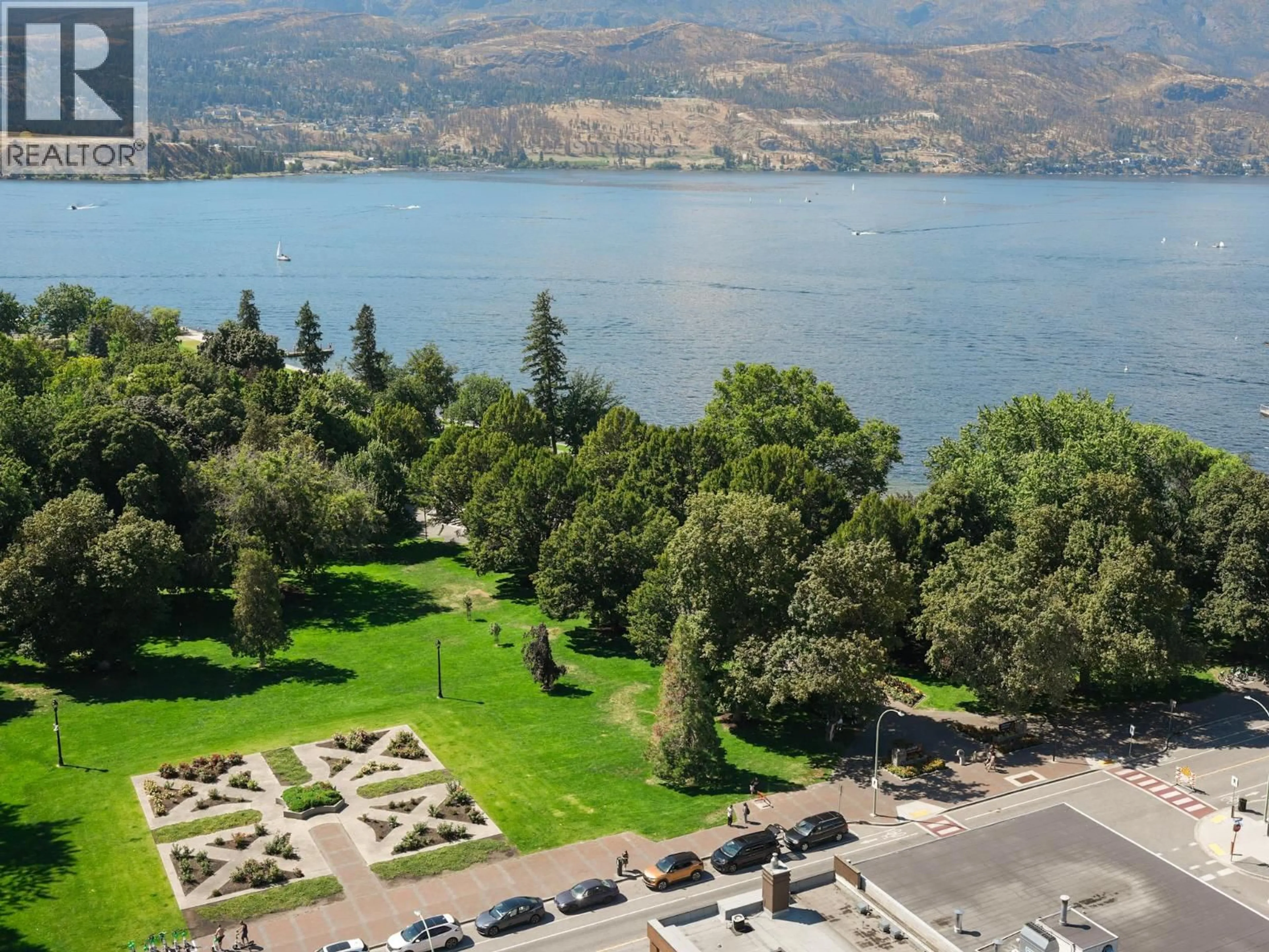 A pic from outside/outdoor area/front of a property/back of a property/a pic from drone, water/lake/river/ocean view for 1507 - 238 LEON AVENUE, Kelowna British Columbia V1Y6H9