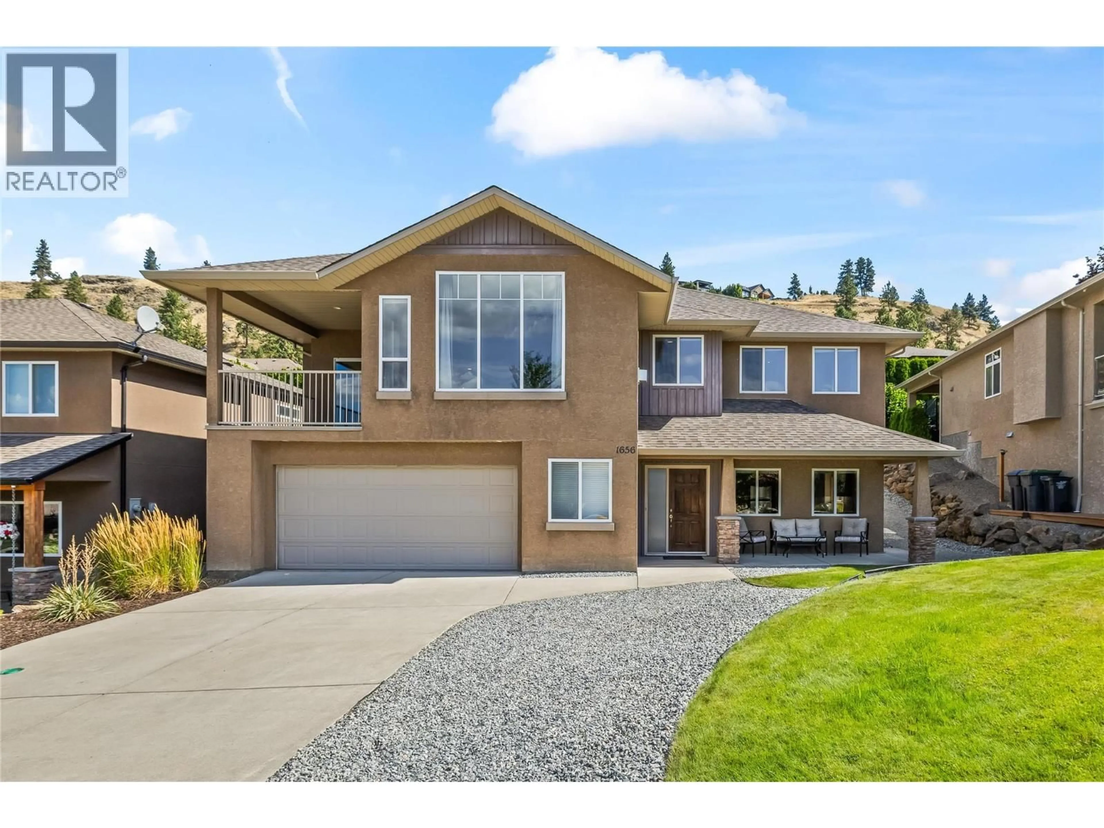 Home with brick exterior material, street for 1656 MERLOT DRIVE, West Kelowna British Columbia V4T2X7