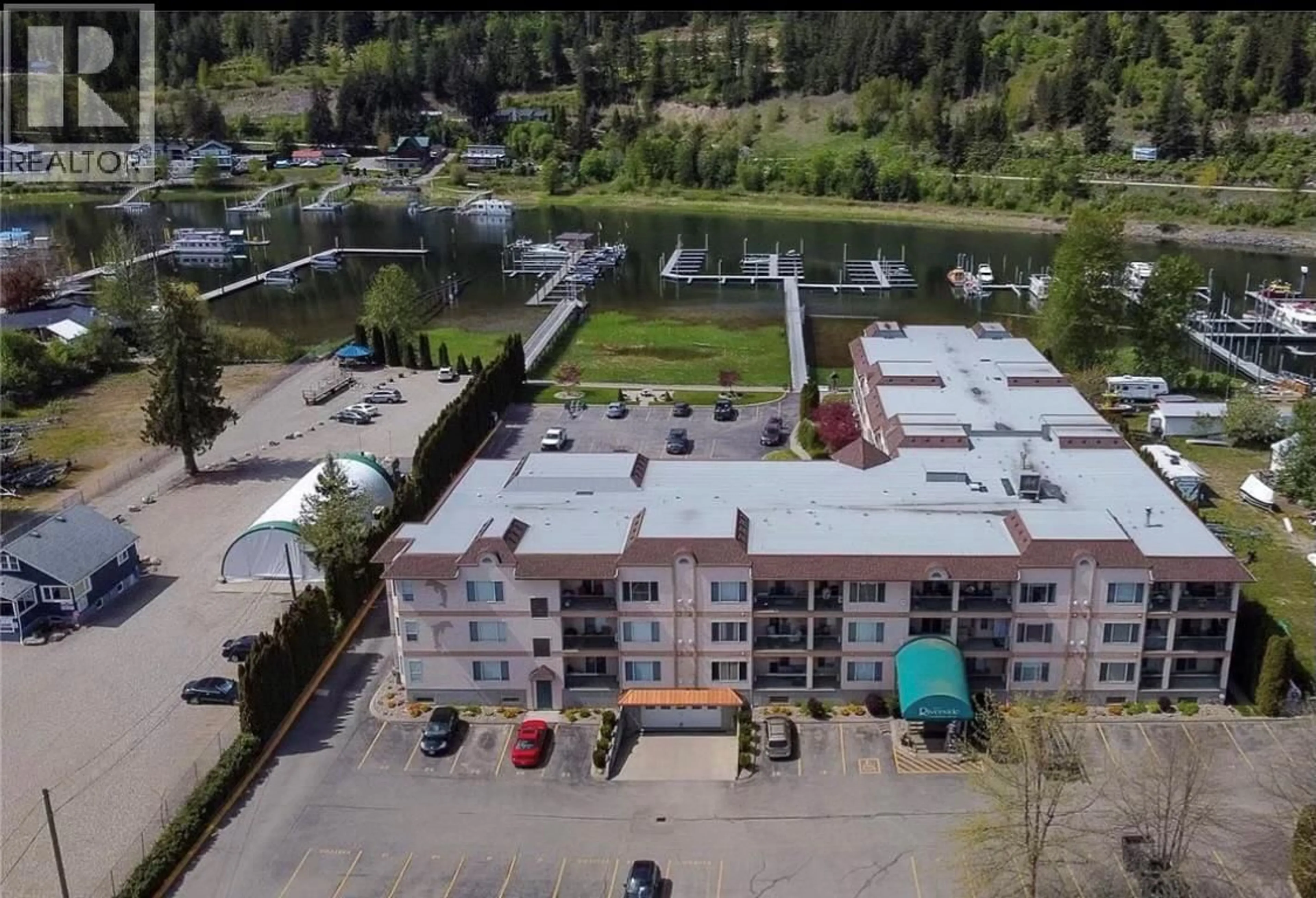 A pic from outside/outdoor area/front of a property/back of a property/a pic from drone, building for 201 - 1002 RIVERSIDE AVENUE, Sicamous British Columbia V0E2V1