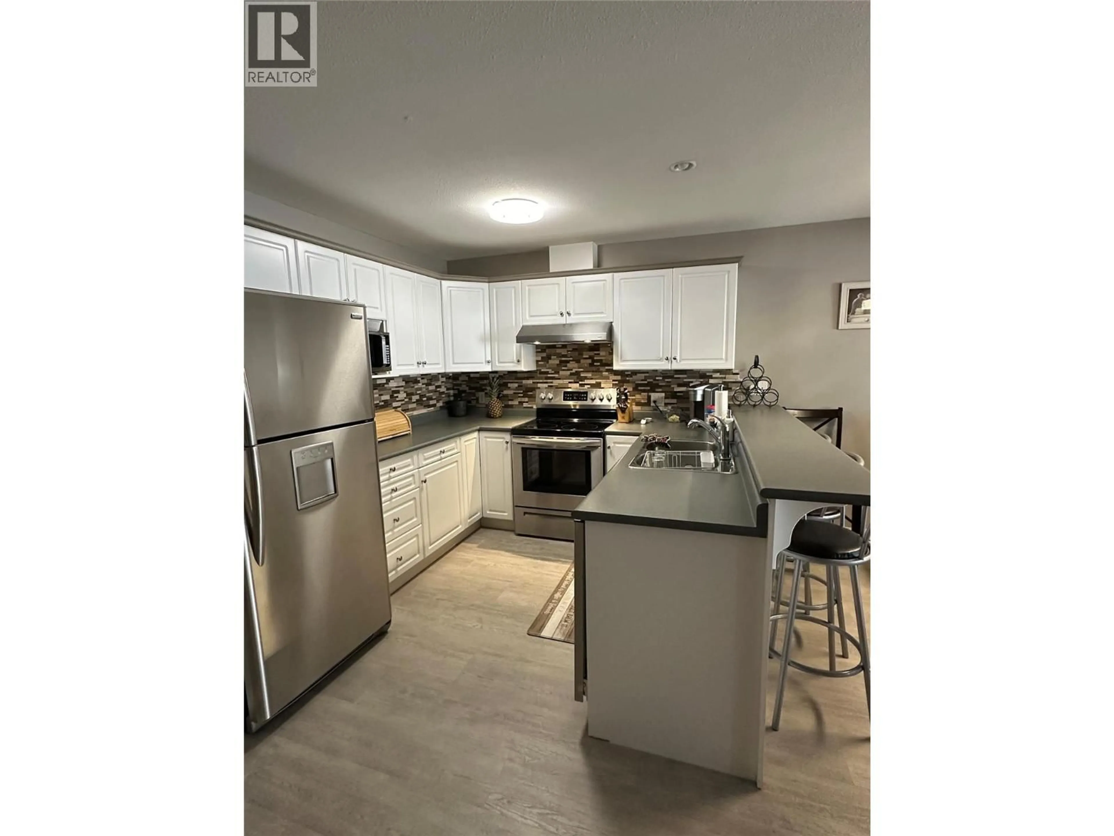 Open concept kitchen, unknown for 201 - 1002 RIVERSIDE AVENUE, Sicamous British Columbia V0E2V1