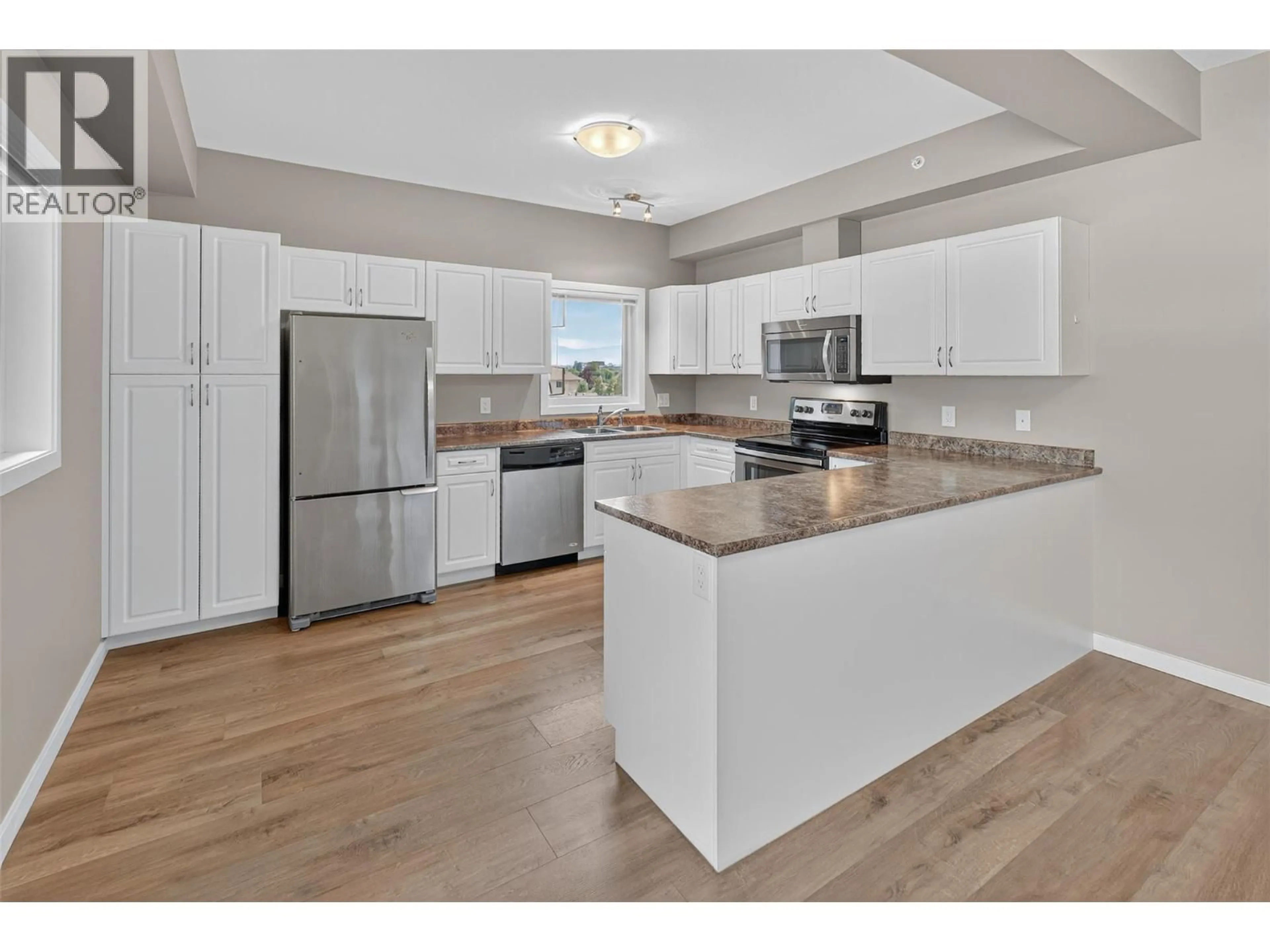 Open concept kitchen, unknown for 407 - 770 RUTLAND ROAD, Kelowna British Columbia V1X3B7