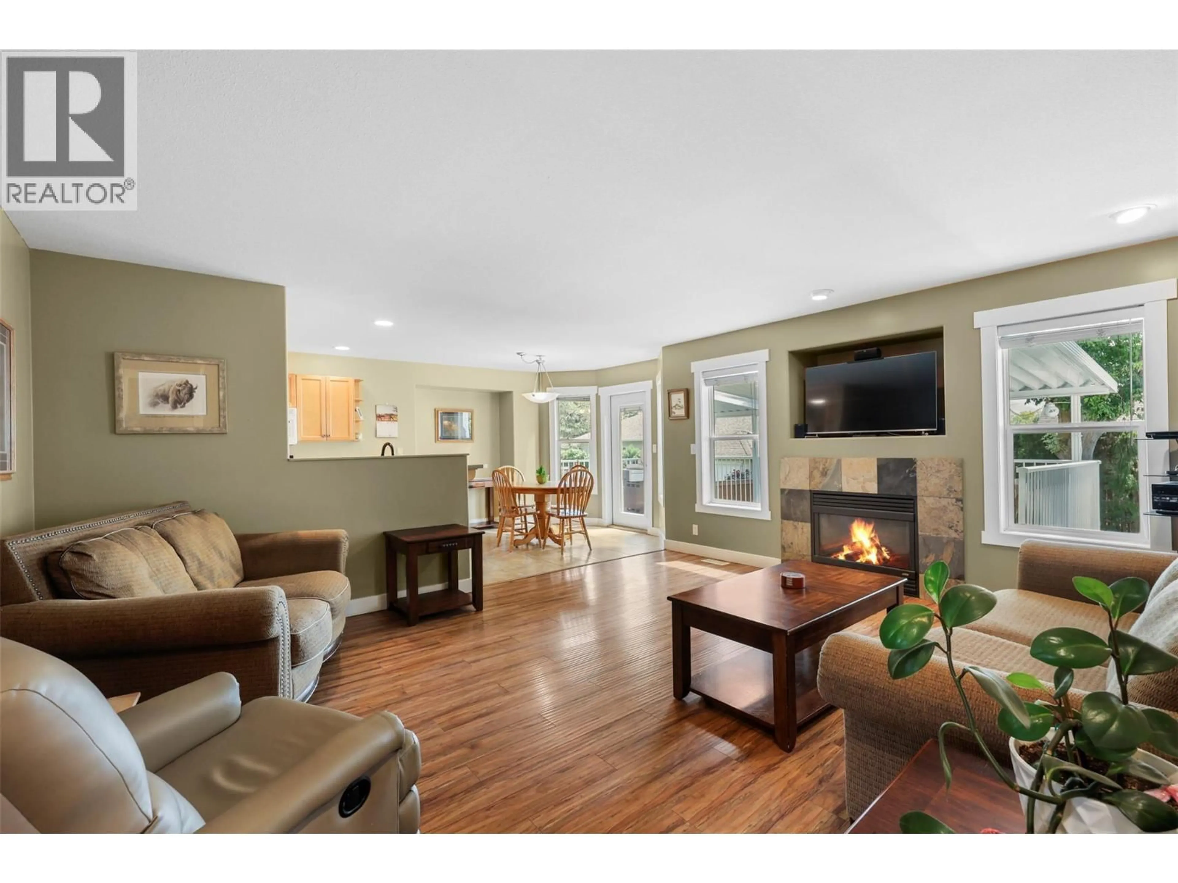 Living room with furniture, wood/laminate floor for 625 MCCURRACH PLACE, Kamloops British Columbia V2B8R1