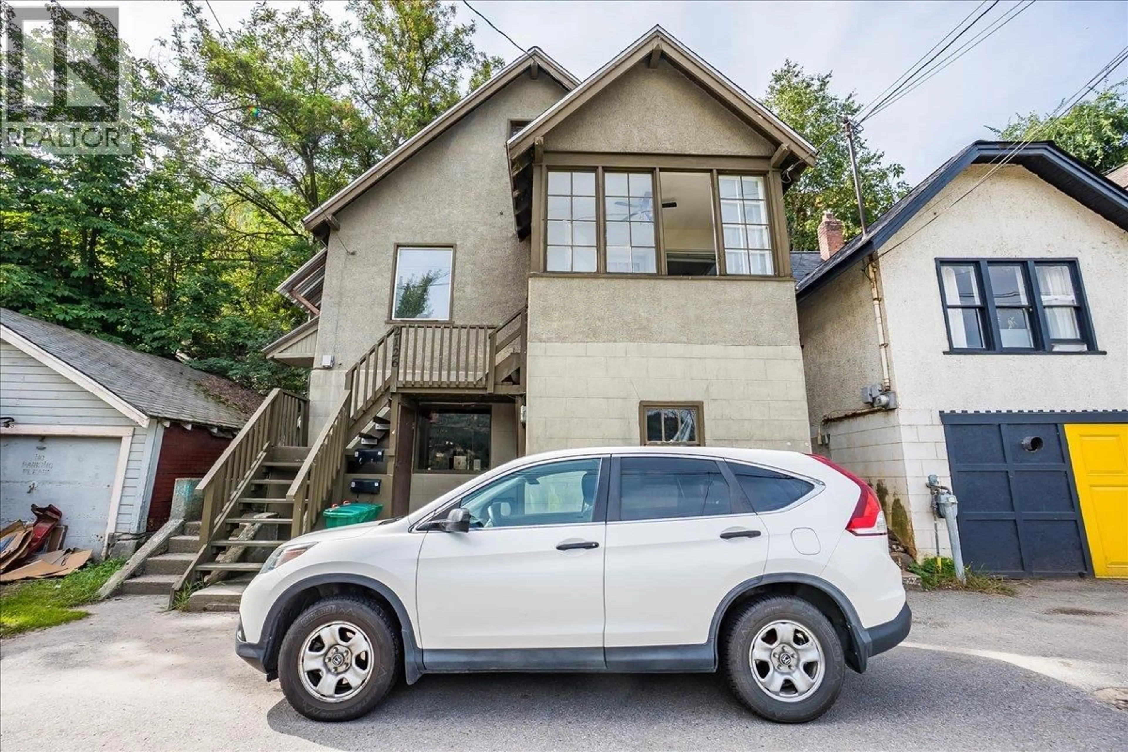 Home with vinyl exterior material, street for 2126 TOPPING STREET, Trail British Columbia V1R4G5