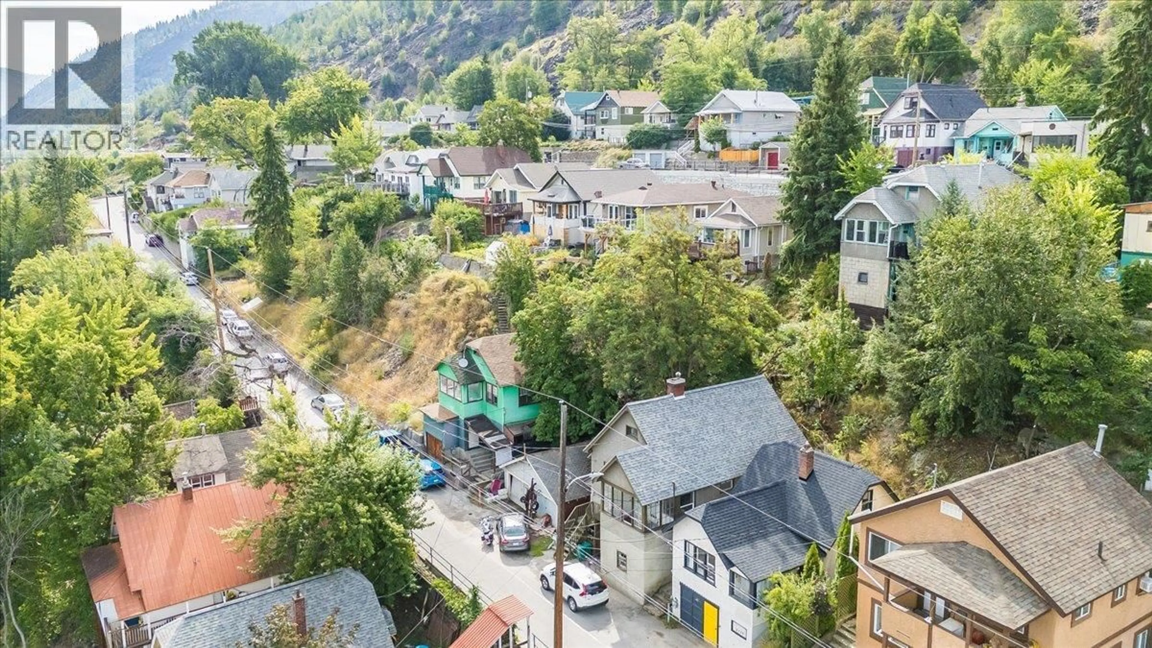 A pic from outside/outdoor area/front of a property/back of a property/a pic from drone, mountain view for 2126 TOPPING STREET, Trail British Columbia V1R4G5