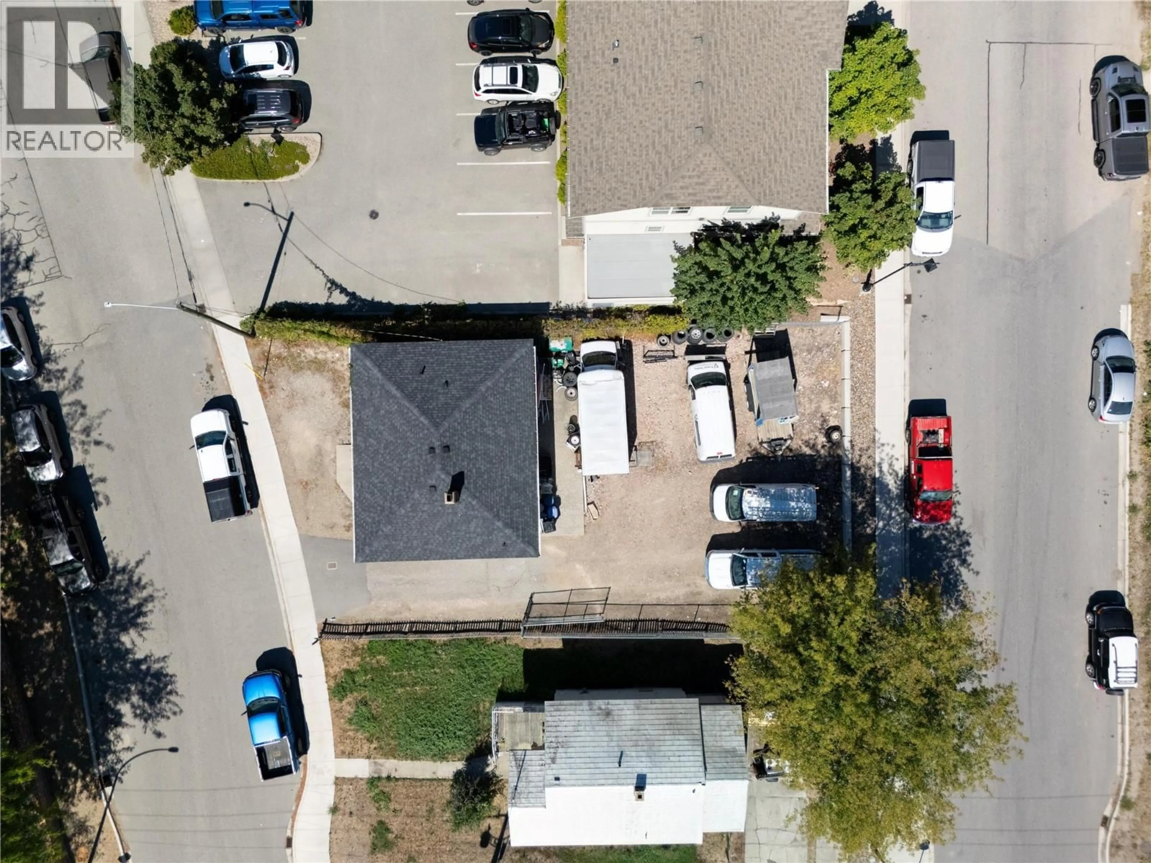 A pic from outside/outdoor area/front of a property/back of a property/a pic from drone, street for 3703 28A STREET, Vernon British Columbia V1T5A2