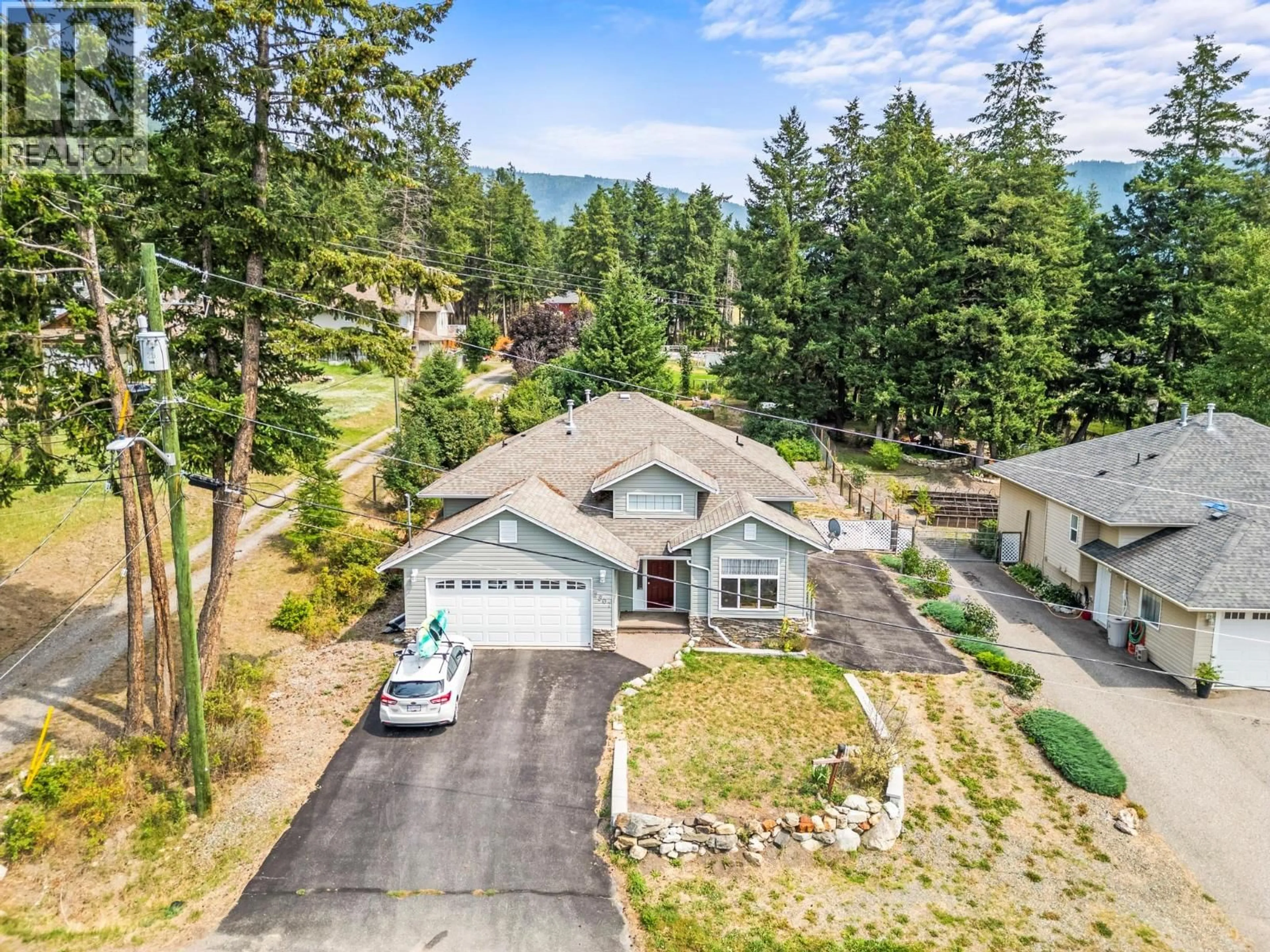 A pic from outside/outdoor area/front of a property/back of a property/a pic from drone, mountain view for 2907 GYP ROAD, Falkland British Columbia V0E1W0