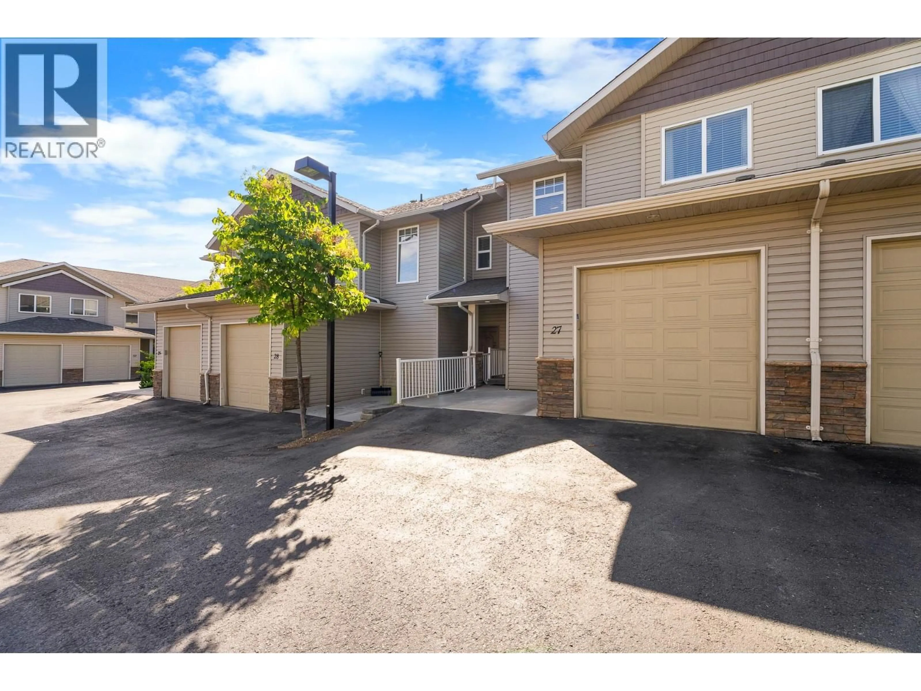 A pic from outside/outdoor area/front of a property/back of a property/a pic from drone, street for 27 - 2046 ROBSON PLACE, Kamloops British Columbia V2E0A5