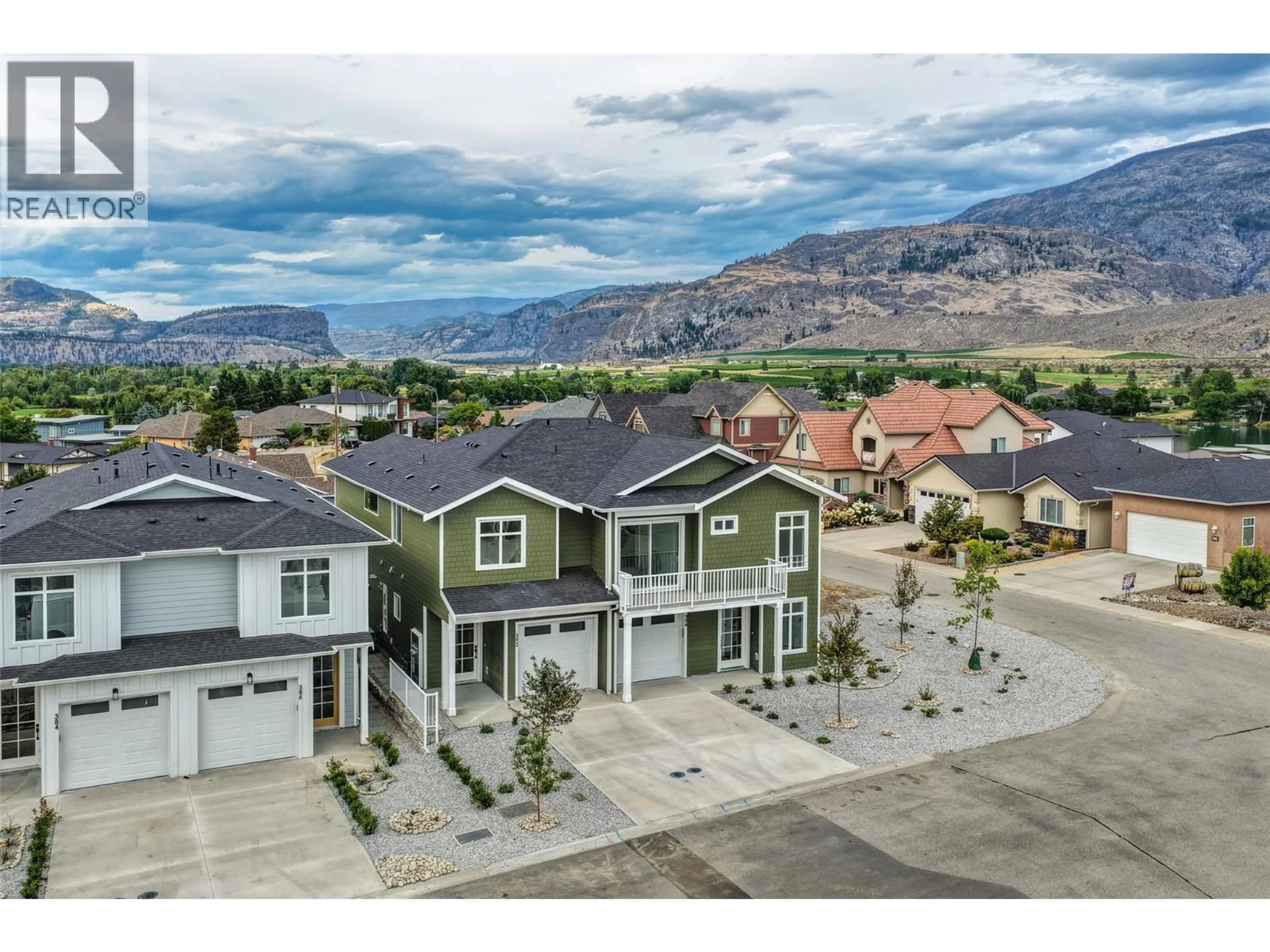 A pic from outside/outdoor area/front of a property/back of a property/a pic from drone, mountain view for 392 CHARDONNAY AVENUE, Oliver British Columbia V0H1T4