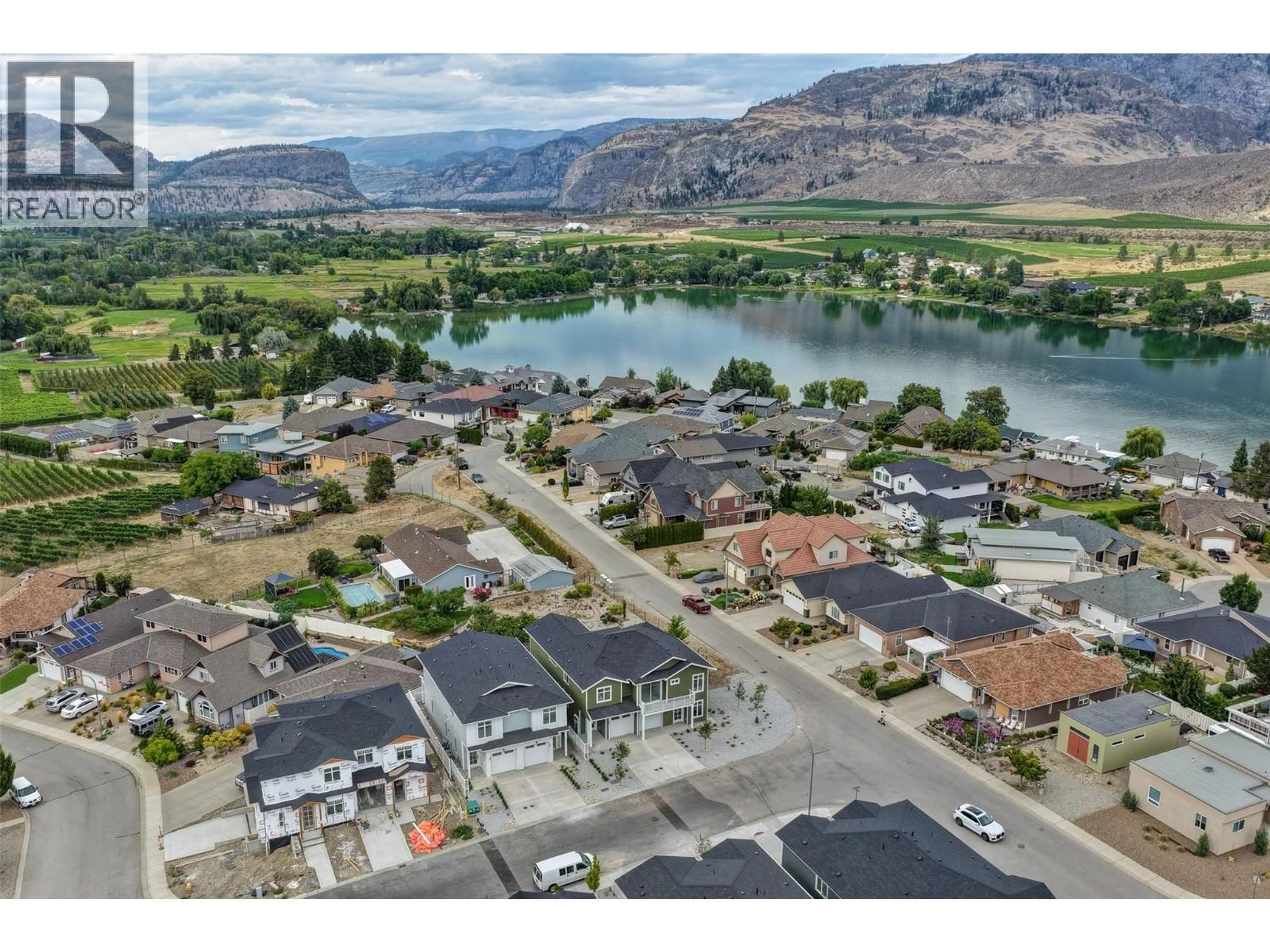 A pic from outside/outdoor area/front of a property/back of a property/a pic from drone, water/lake/river/ocean view for 392 CHARDONNAY AVENUE, Oliver British Columbia V0H1T4