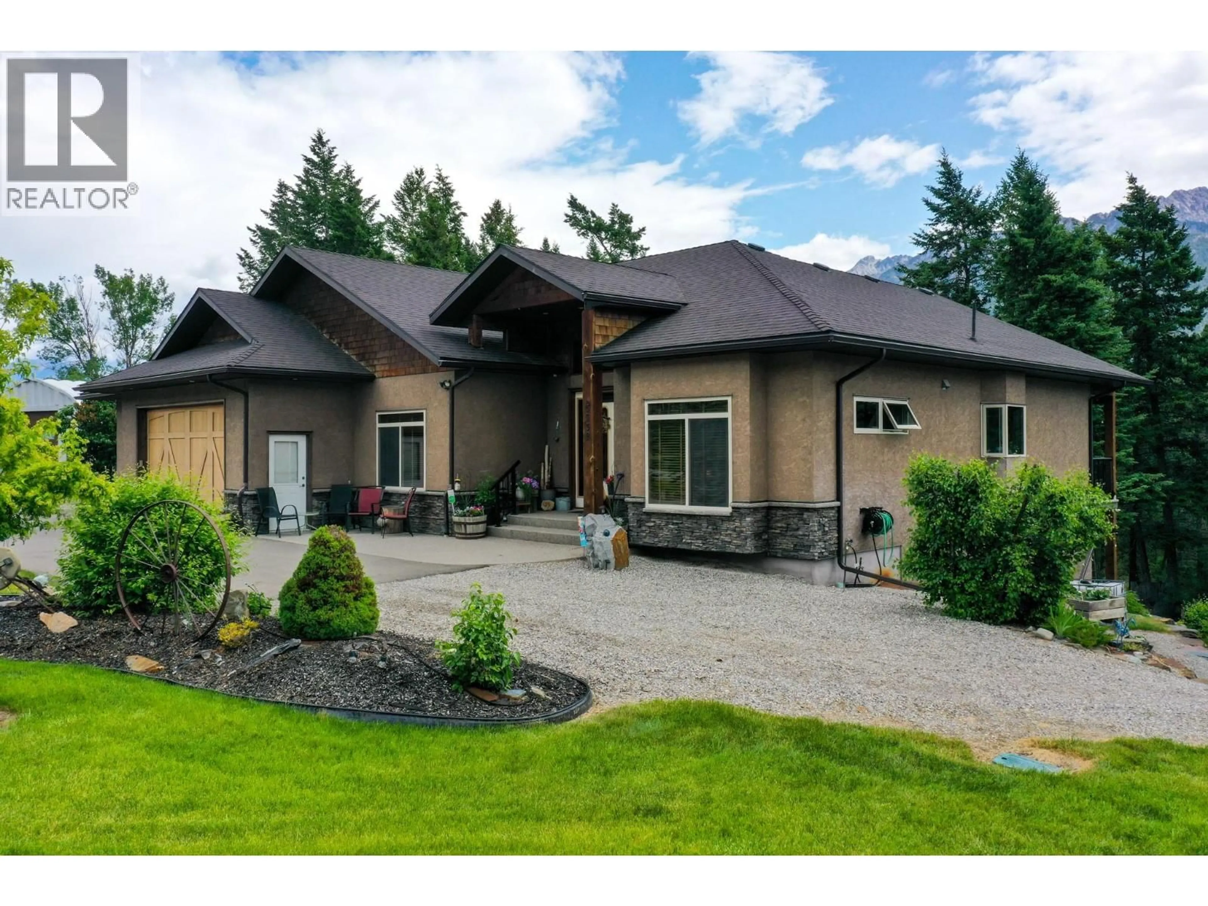 Home with brick exterior material, unknown for 5938 COLUMBIA LAKE ROAD, Fairmont Hot Springs British Columbia V0B1L2