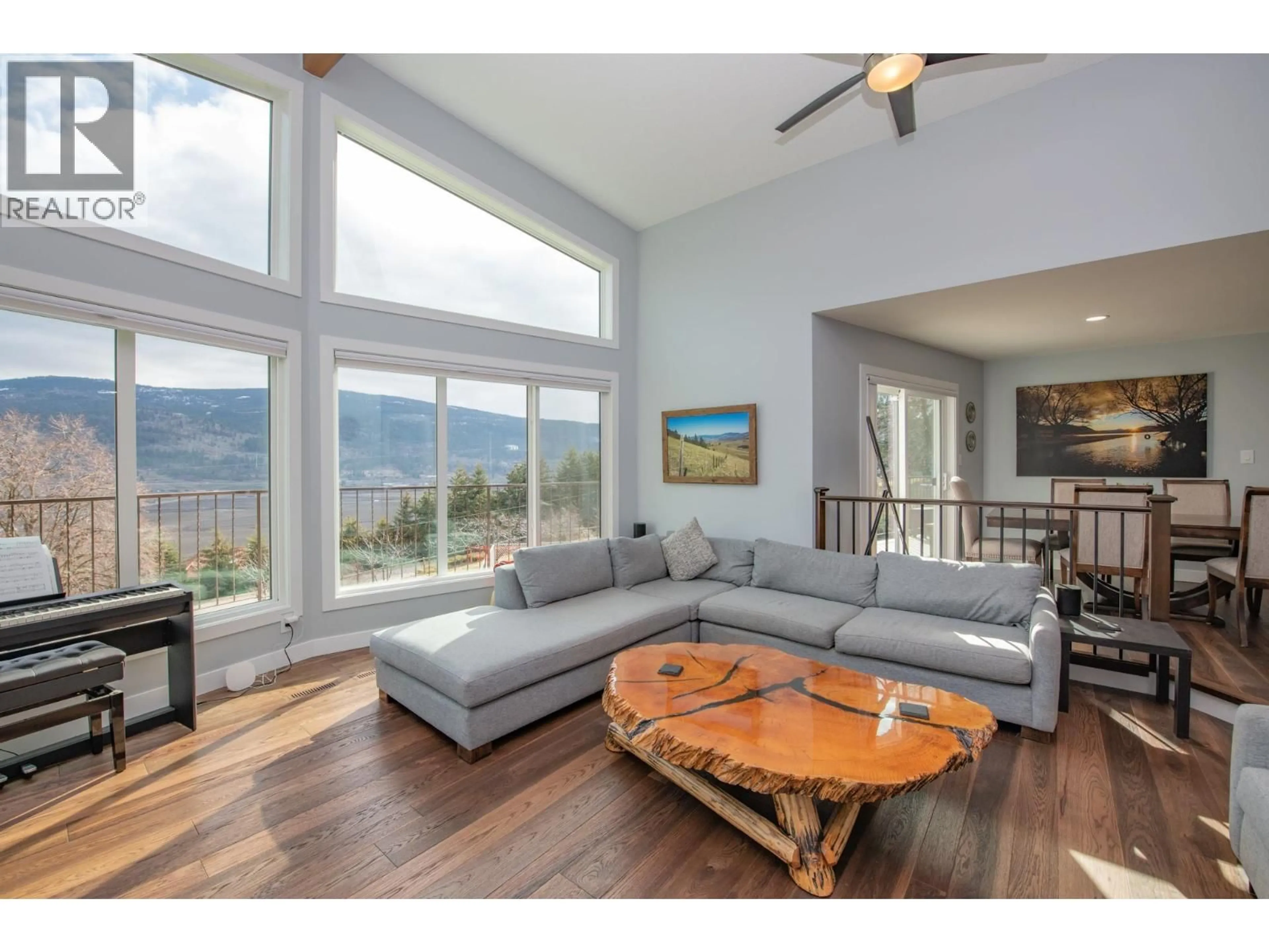 Living room with furniture, wood/laminate floor for 171 OVERLOOK PLACE, Spallumcheen British Columbia V1H1X1