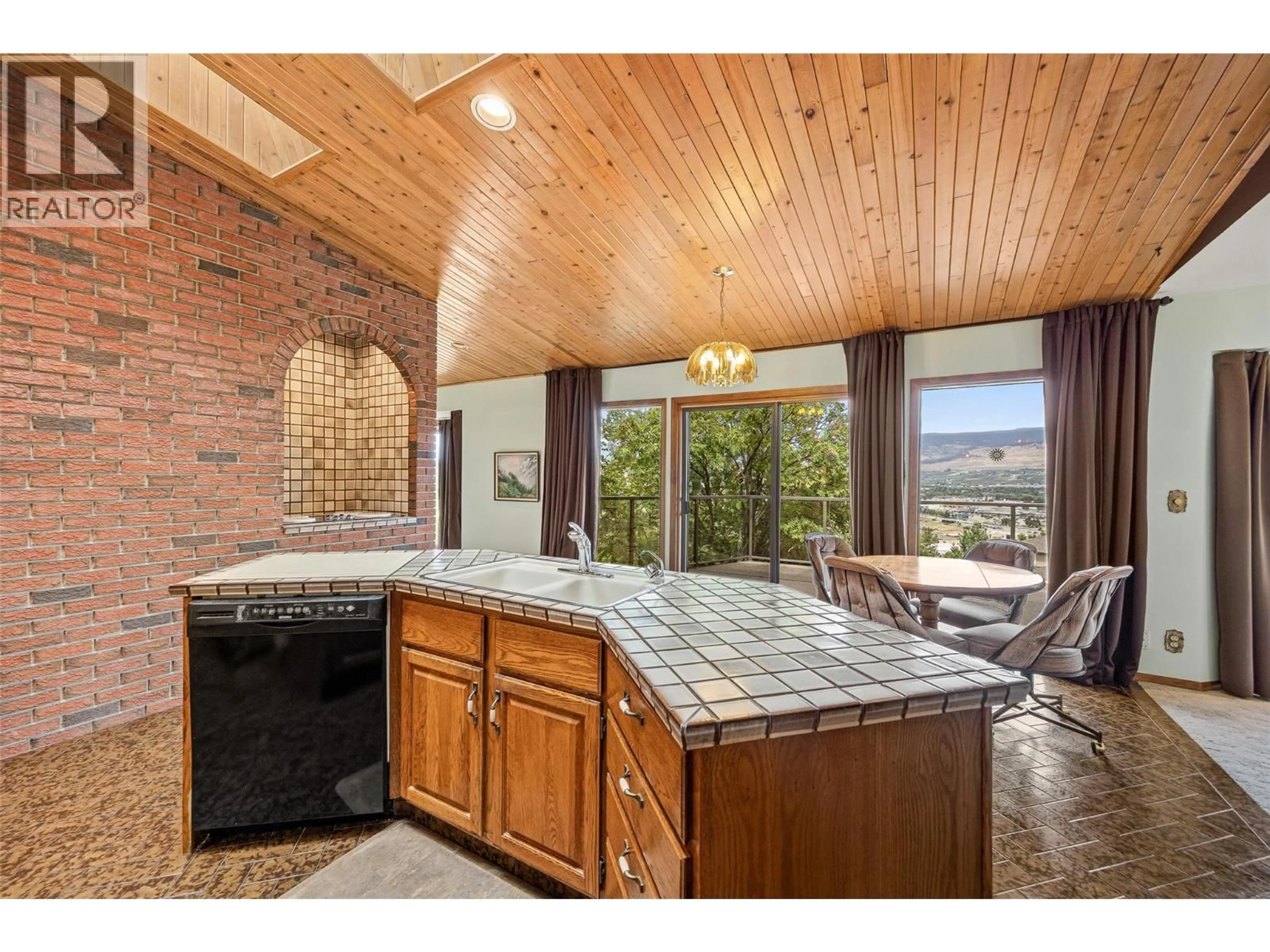 Open concept kitchen, ceramic/tile floor for 975 MONASHEE PLACE, Kelowna British Columbia V1V1J5