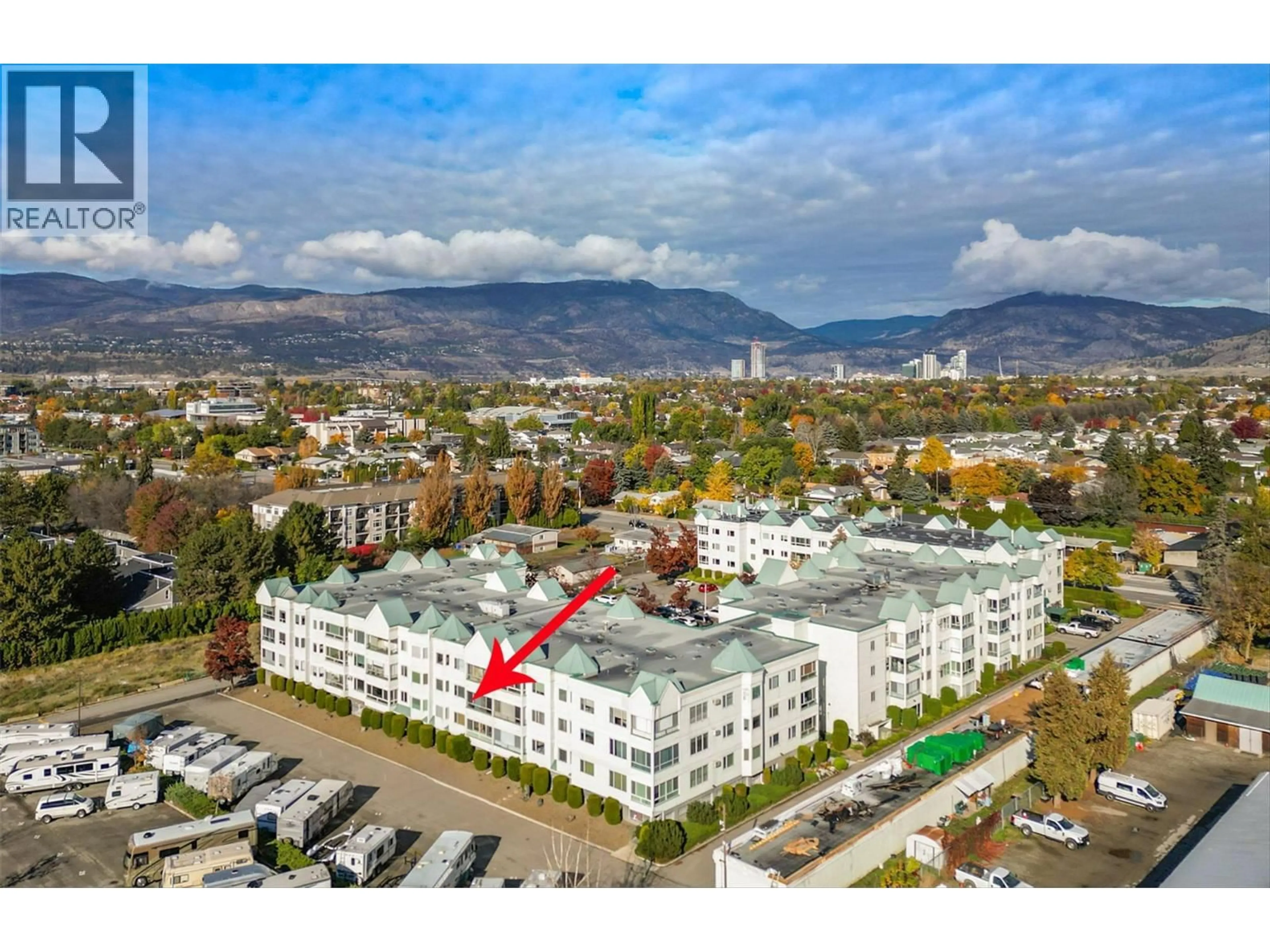 A pic from outside/outdoor area/front of a property/back of a property/a pic from drone, mountain view for 212 - 1329 KLO ROAD, Kelowna British Columbia V1W3N9