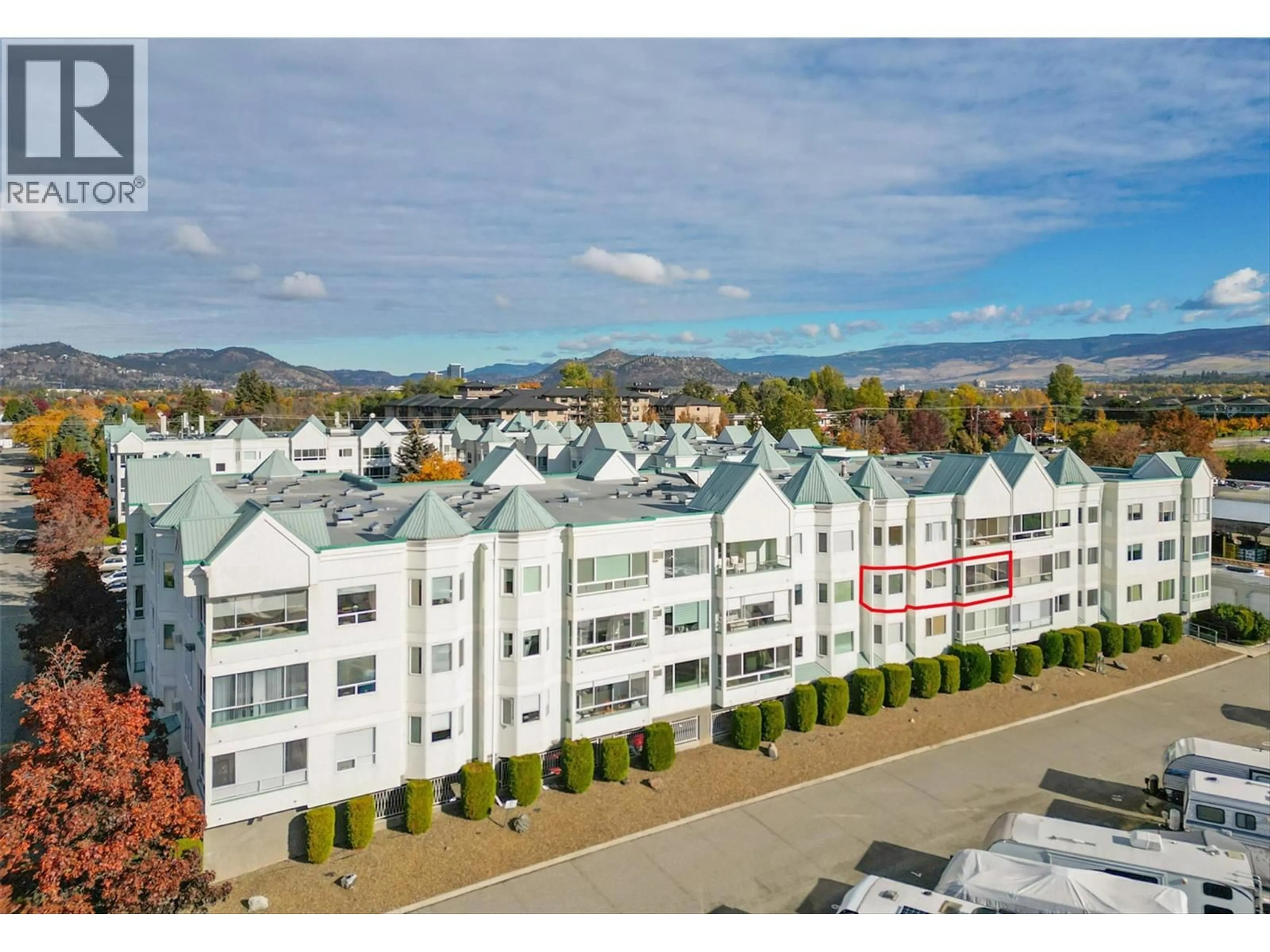 A pic from outside/outdoor area/front of a property/back of a property/a pic from drone, mountain view for 212 - 1329 KLO ROAD, Kelowna British Columbia V1W3N9