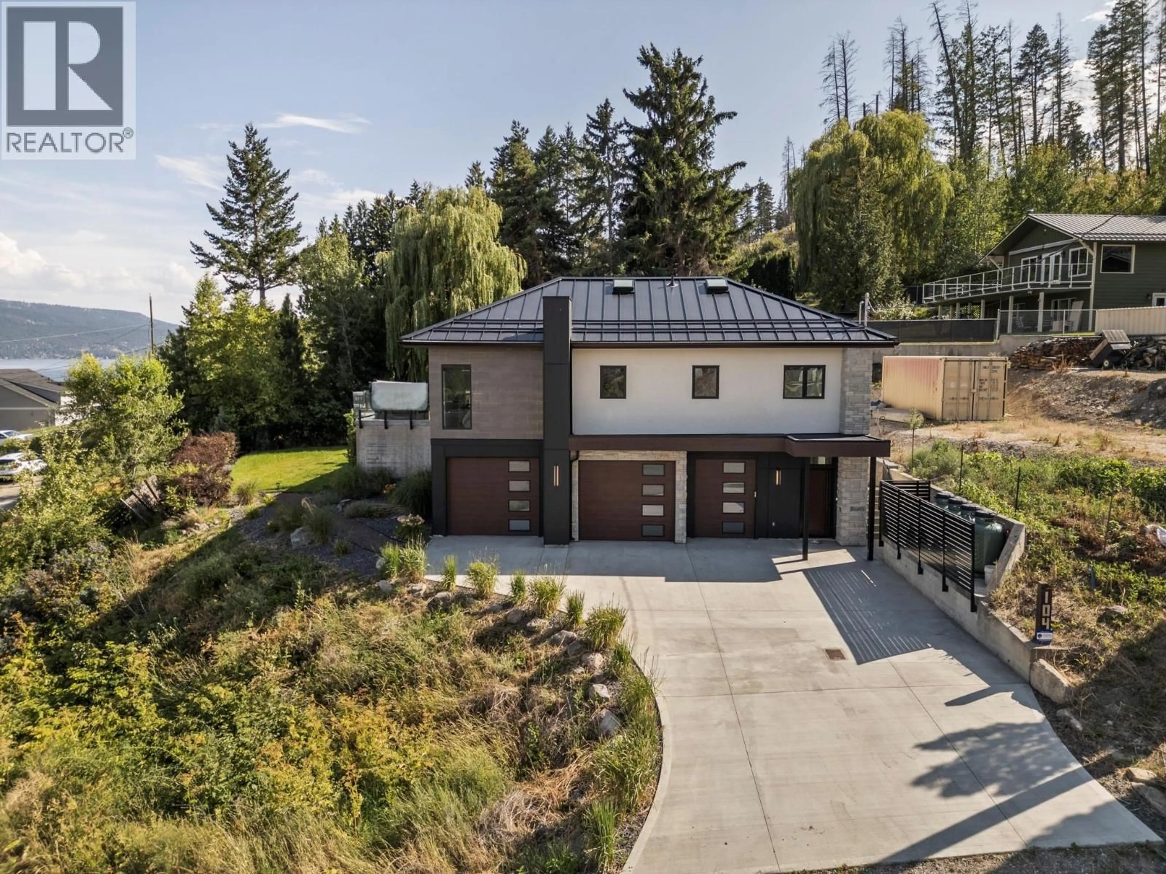 A pic from outside/outdoor area/front of a property/back of a property/a pic from drone, unknown for 104 ELLIOT ROAD, Vernon British Columbia V1H2E4
