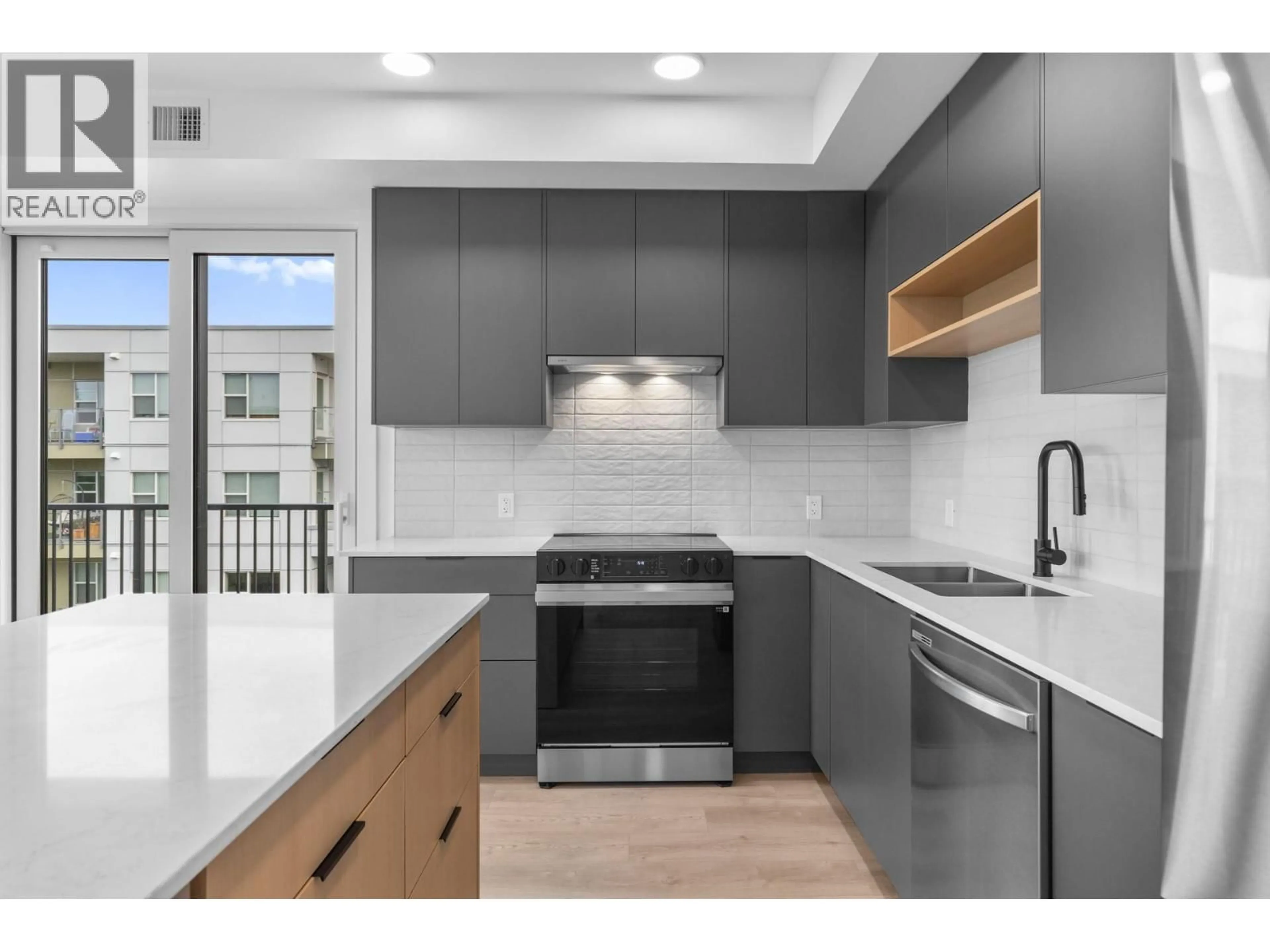 Open concept kitchen, ceramic/tile floor for 406 - 620 CORONATION AVENUE, Kelowna British Columbia V1Y7A1