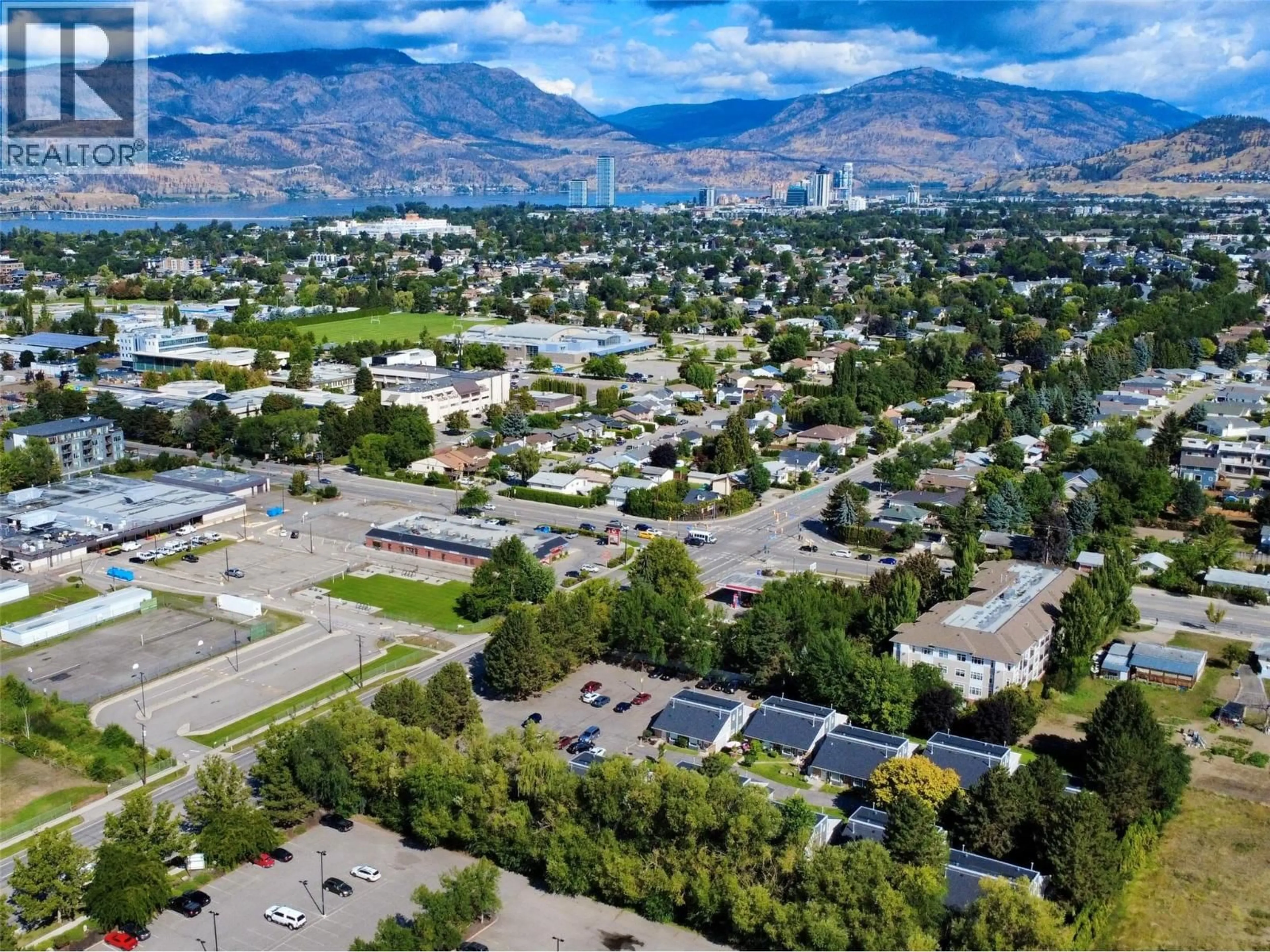 A pic from outside/outdoor area/front of a property/back of a property/a pic from drone, mountain view for 304 - 3155 GORDON DRIVE, Kelowna British Columbia V1W3N6