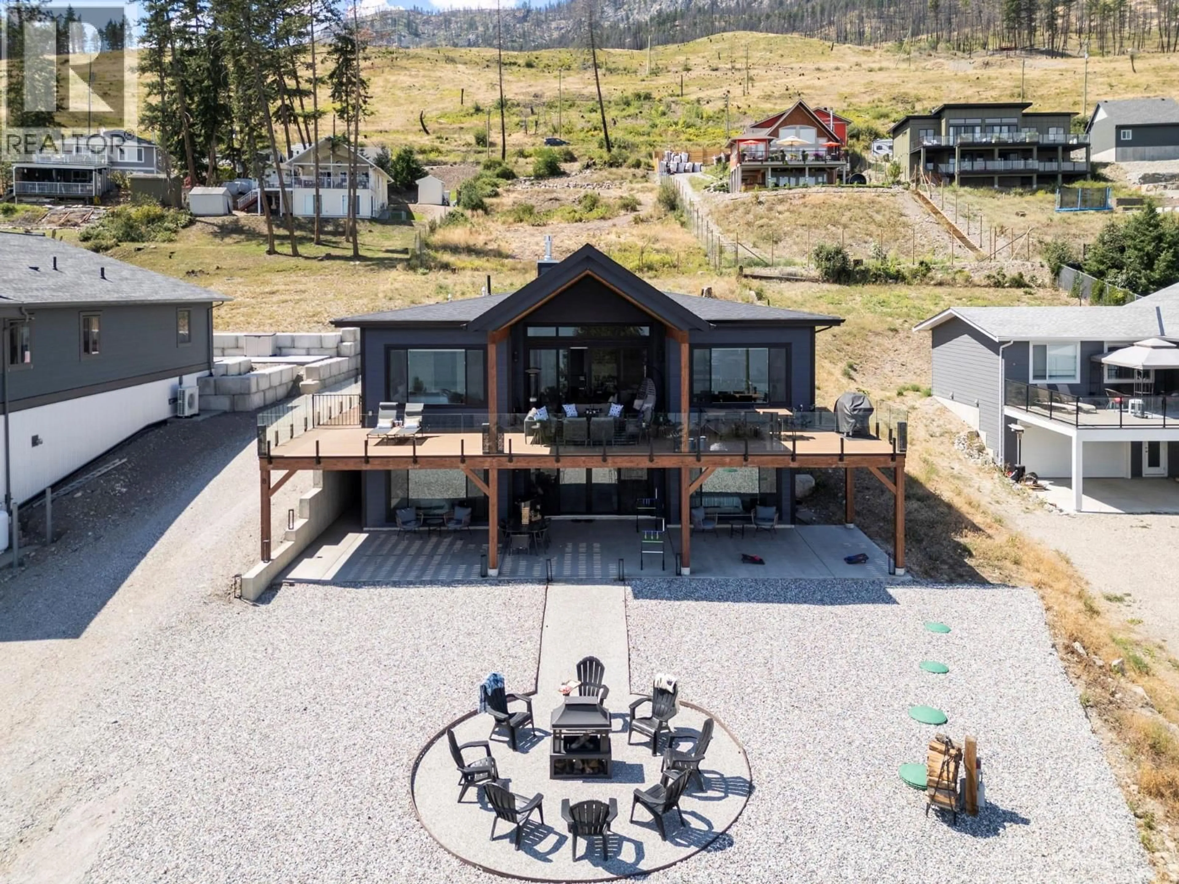 A pic from outside/outdoor area/front of a property/back of a property/a pic from drone, mountain view for 8 KENYON ROAD, Vernon British Columbia V1H2C6