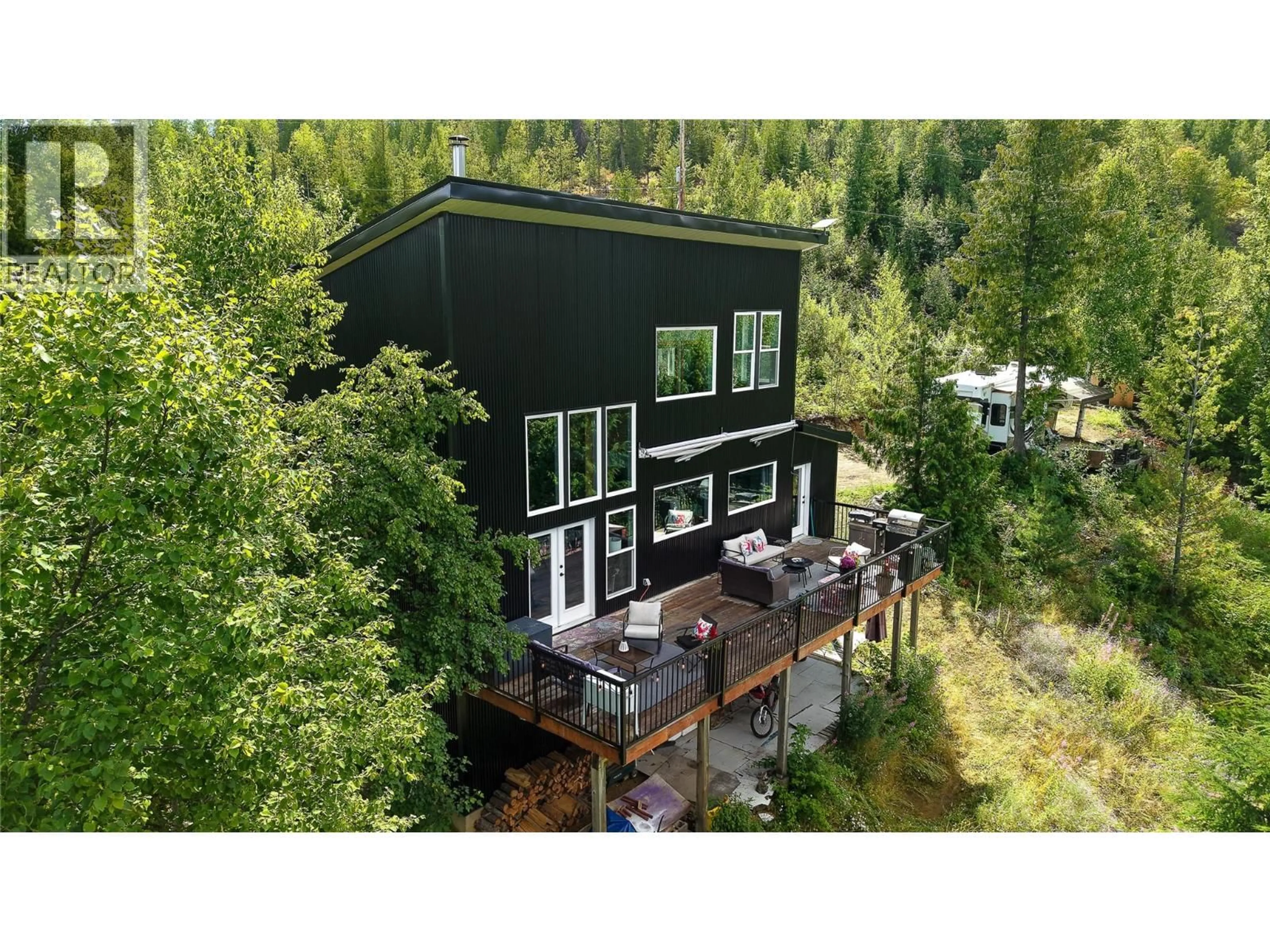 A pic from outside/outdoor area/front of a property/back of a property/a pic from drone, unknown for 300 RICHIE ROAD, Rossland British Columbia V0G1Y0