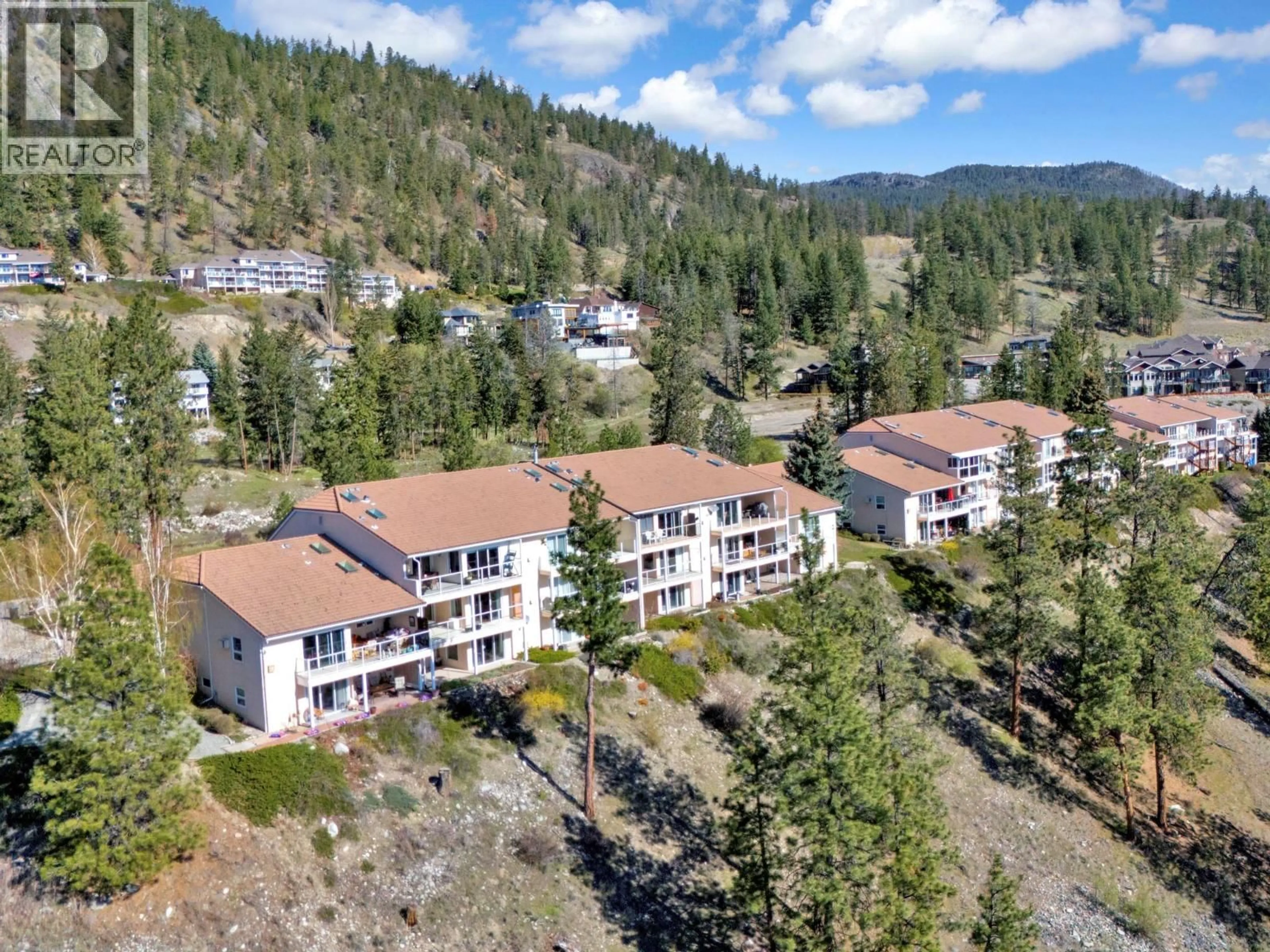 A pic from outside/outdoor area/front of a property/back of a property/a pic from drone, mountain view for 204 - 4470 PONDEROSA DRIVE, Peachland British Columbia V0H1X5