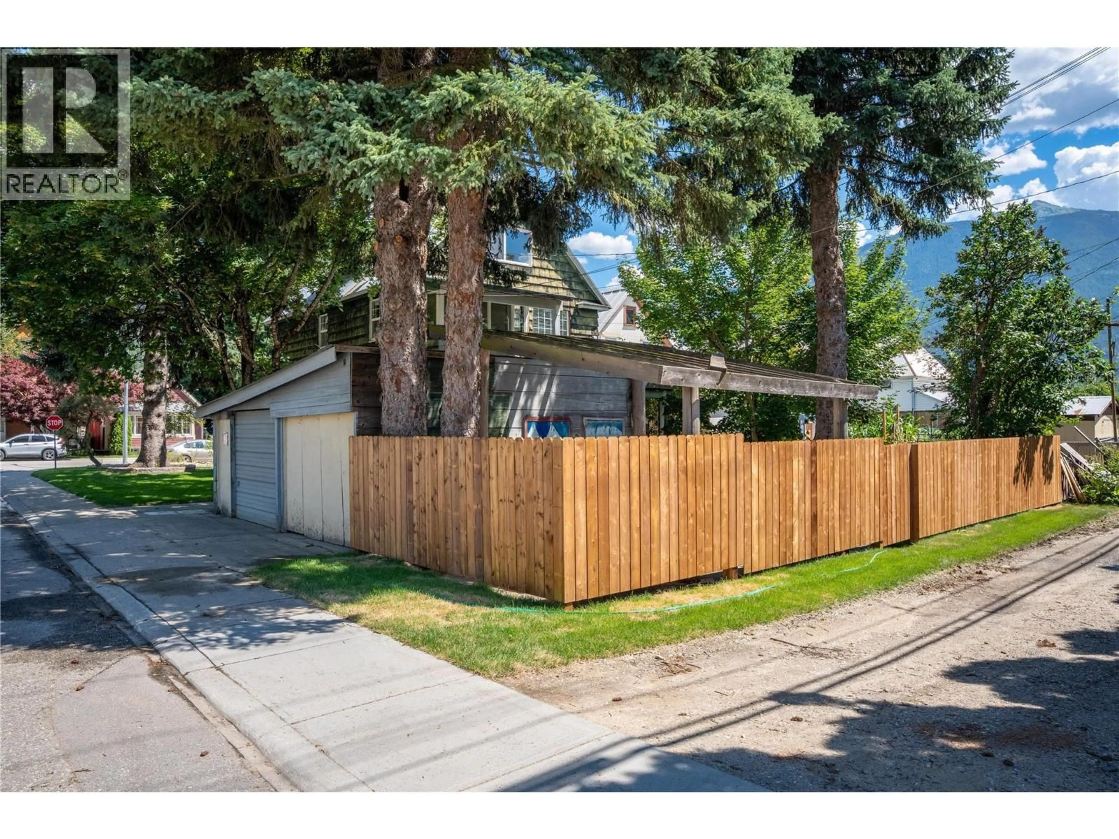 Home with vinyl exterior material, street for 503 THIRD STREET EAST, Revelstoke British Columbia V0E2S0